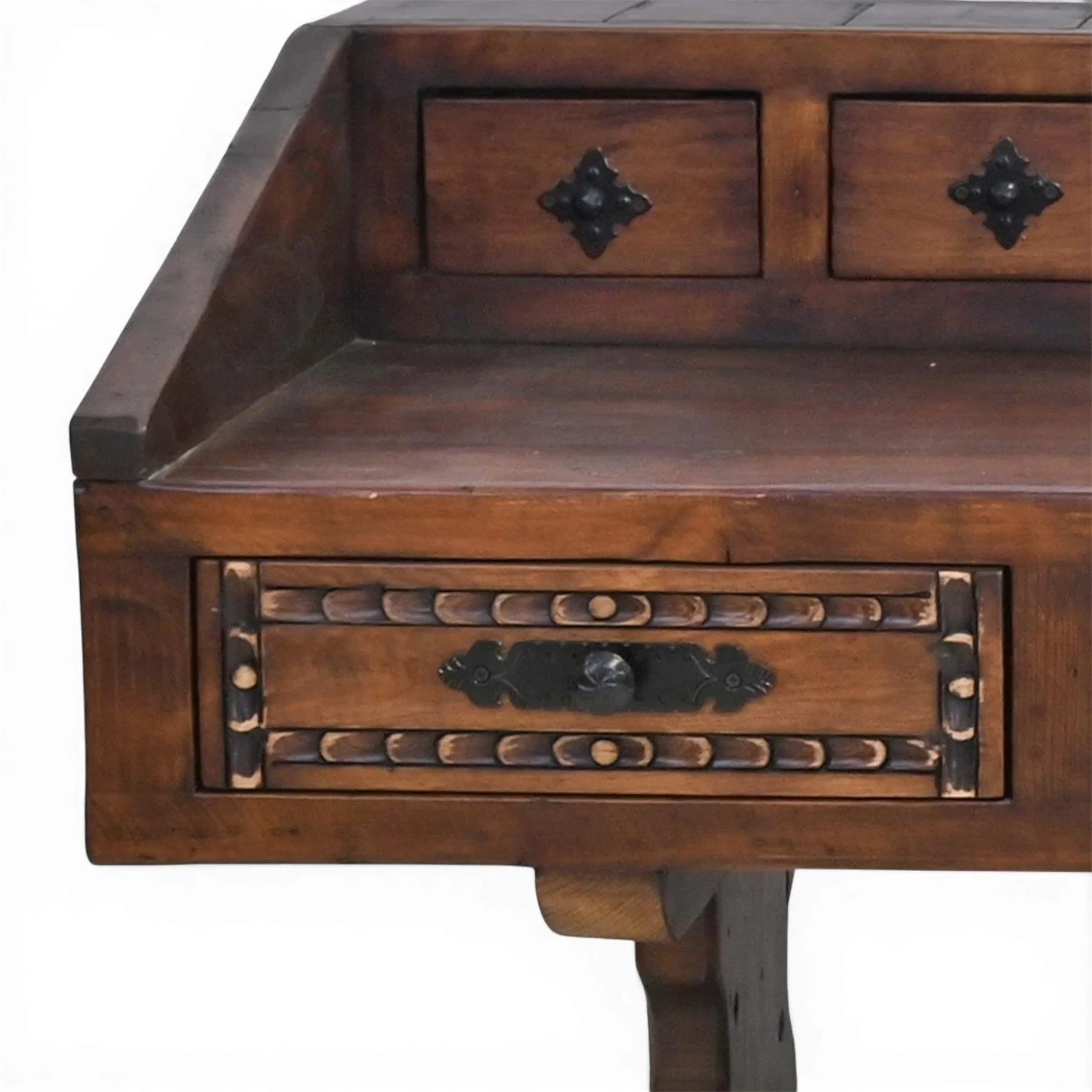 Handmade Mexican Las Carreras dark stained desk with hand-carved details, iron hardware, and multiple drawers