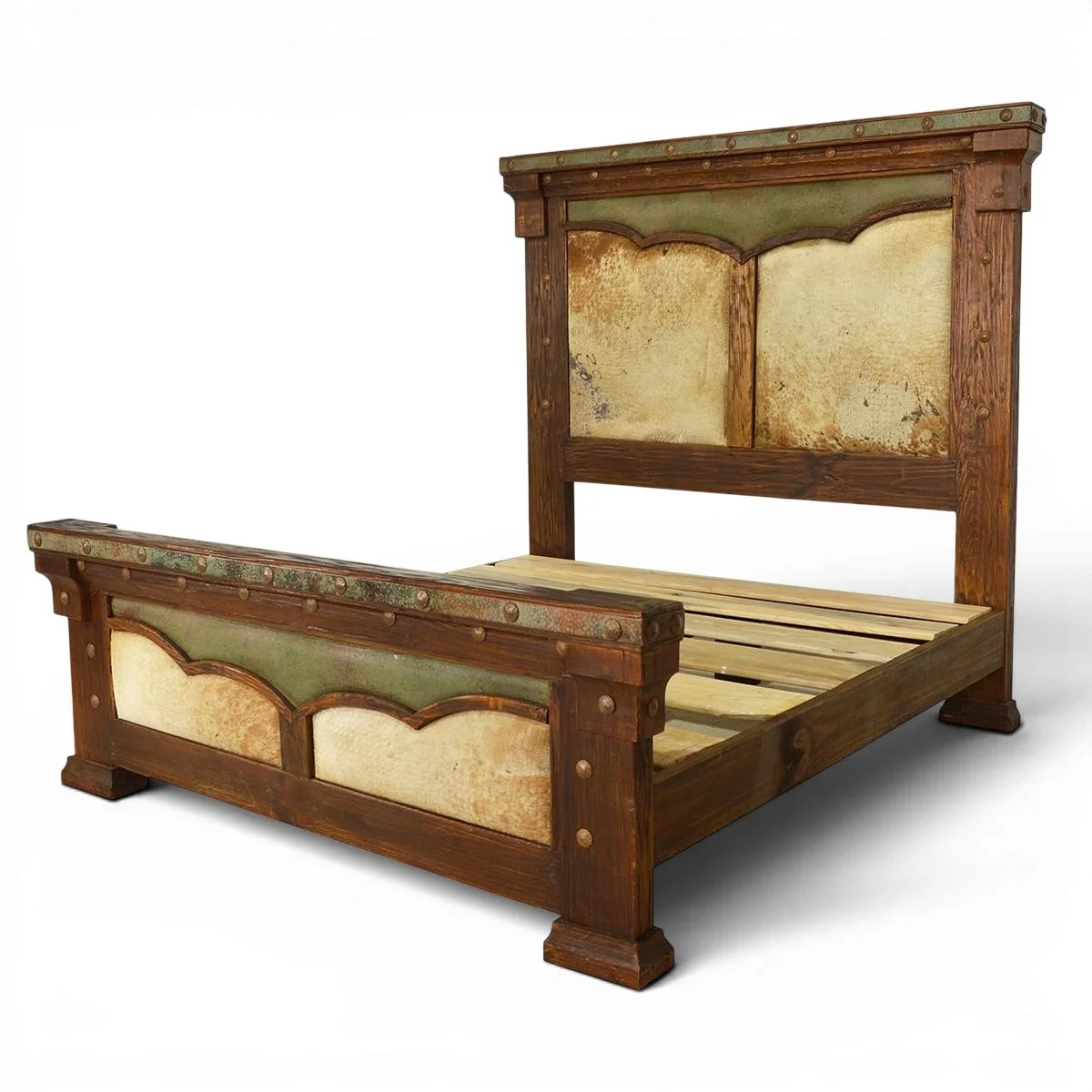 White Sands Copper and Cowhide Bed handcrafted in Mexico with leather panels, hand-pounded copper trim, clavos, and carved wood details.