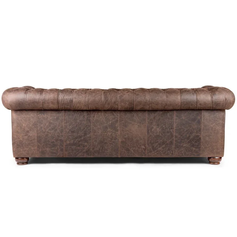 The Big Timber Button Tufted Western Leather Sofa features premium top-grain leather, tufted detailing, nailhead trim, and handcrafted Western elegance for timeless comfort.