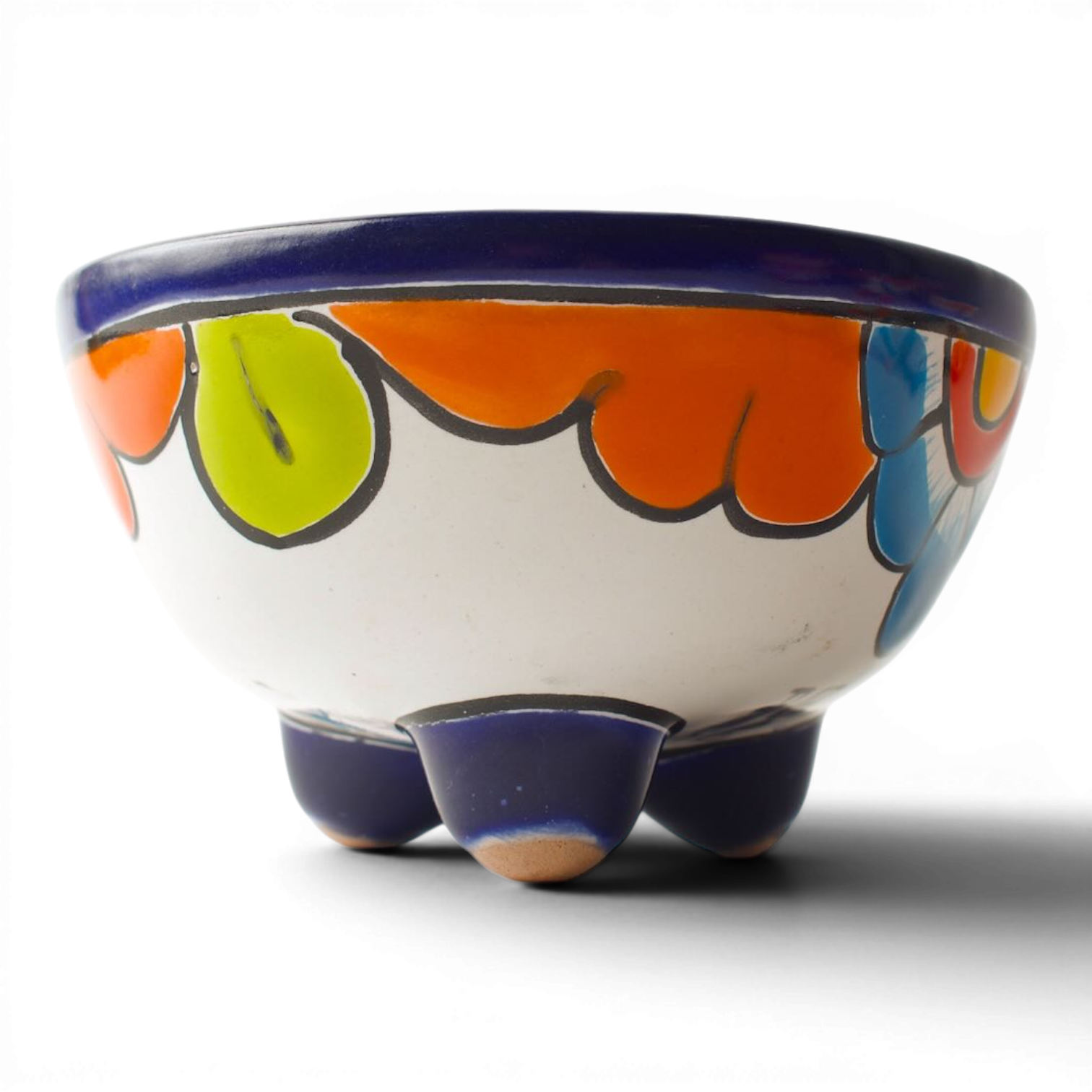 Handmade Mexican Talavera molcajete bowl with colorful hand-painted design and three-legged base