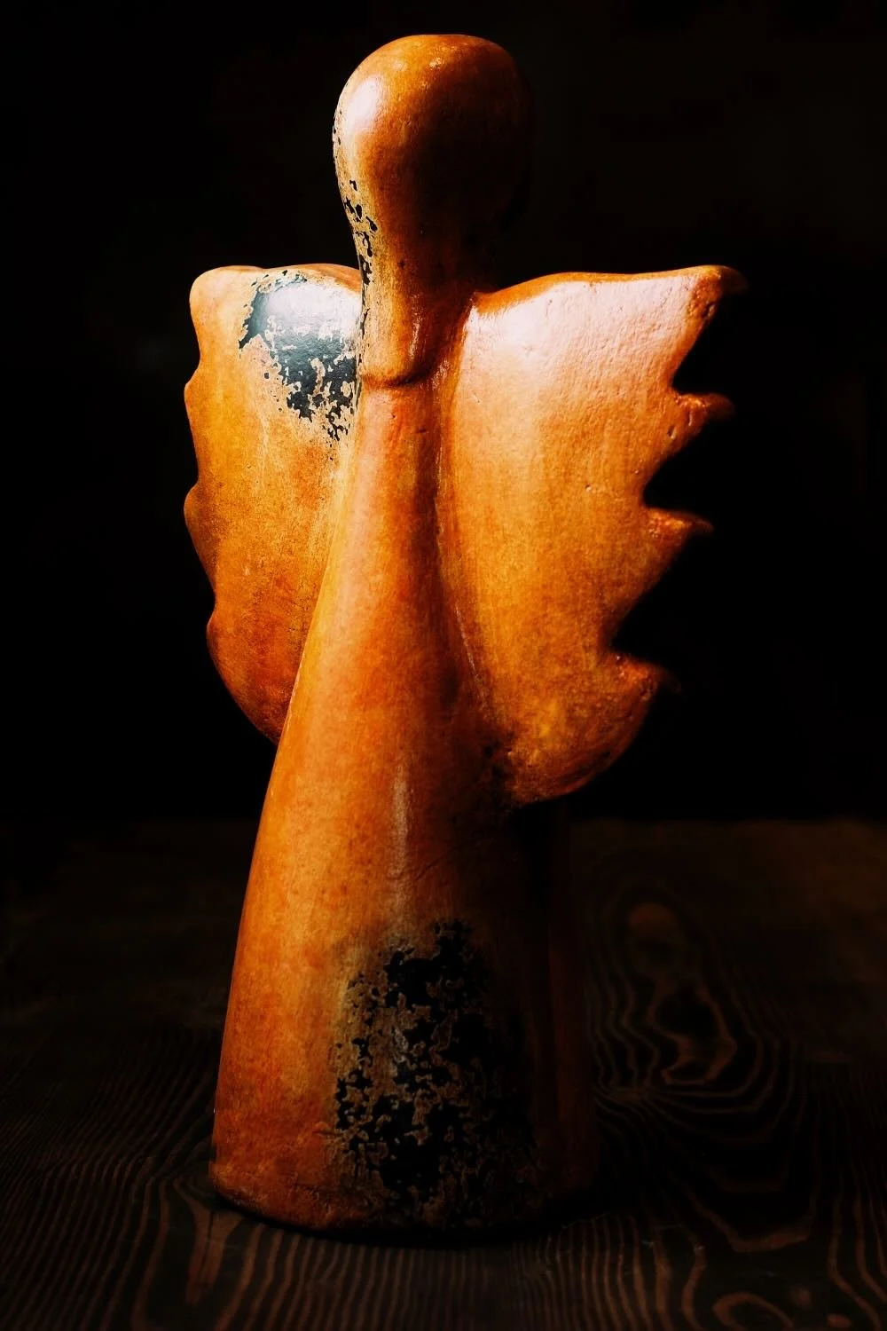 Shop a handmade praying angel sculpture from Mexico. Rustic clay decor with distressed finish and large wings for spiritual home accents.