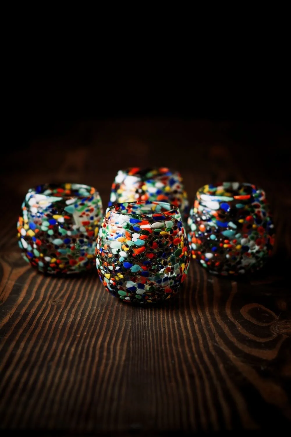 Shop a handblown Guanajuato glass from Mexico. Colorful confetti design artisan drinkware perfect for everyday use or entertaining.