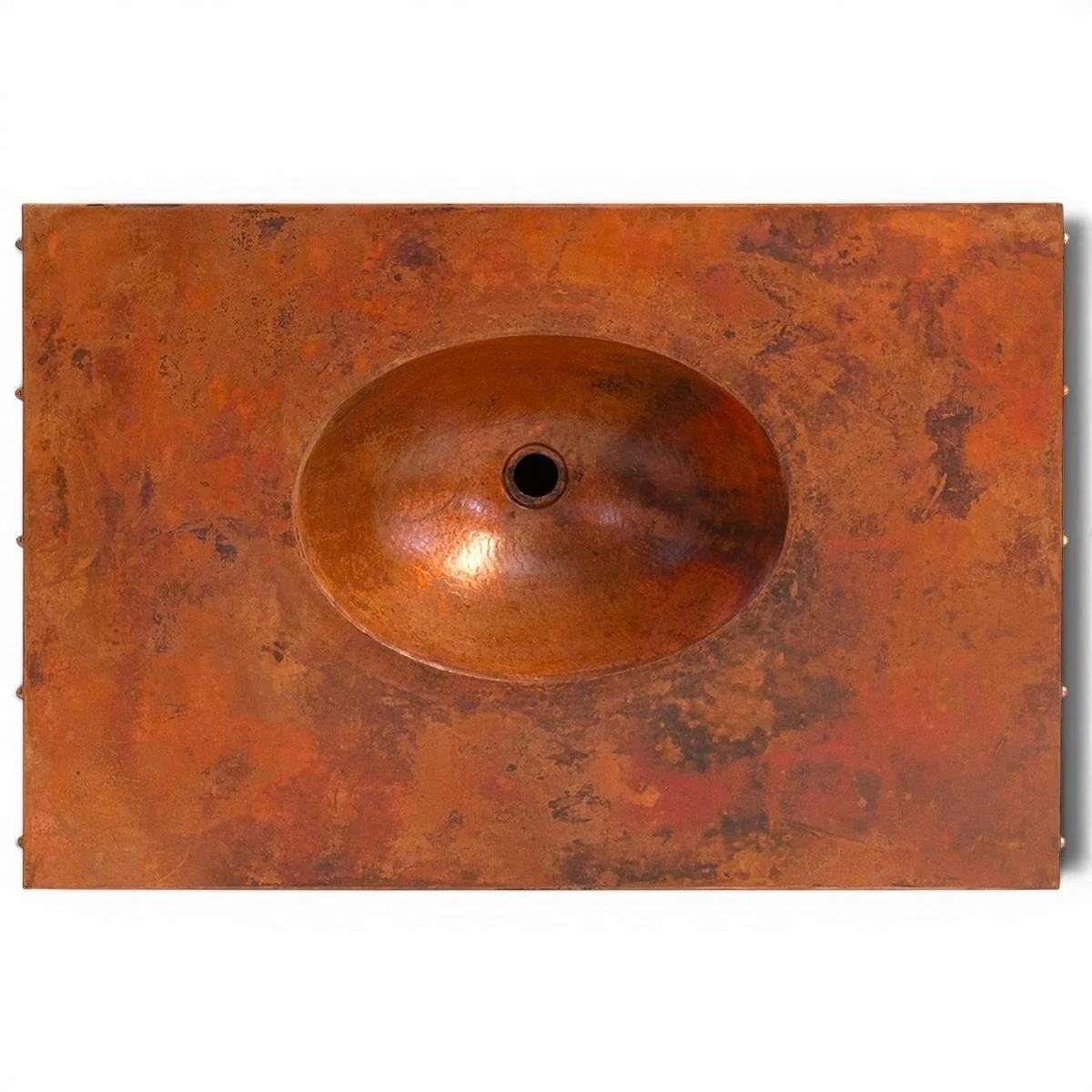 Handmade Peñasco copper bathroom vanity with single sink, copper top and doors, iron hardware, and dark wood finish.