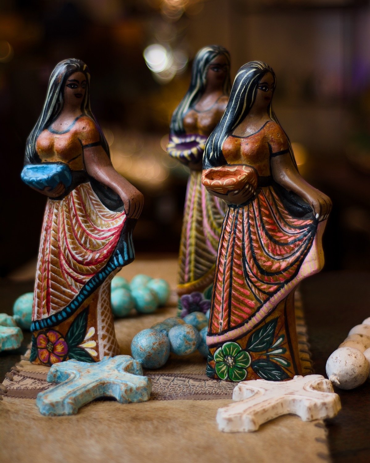 Handmade & painted caly ladies with flowing dress with clay rosary beads from Mexico.