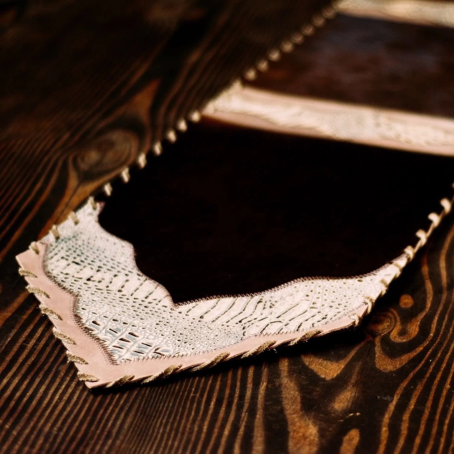 Handmade Brazilian cowhide table runner with tooled leather - Seventeen