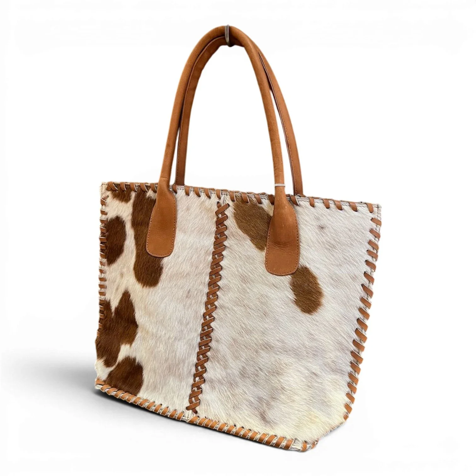 Handmade Brazilian Cheyenne cowhide tote bag with leather handles and detailed stitching