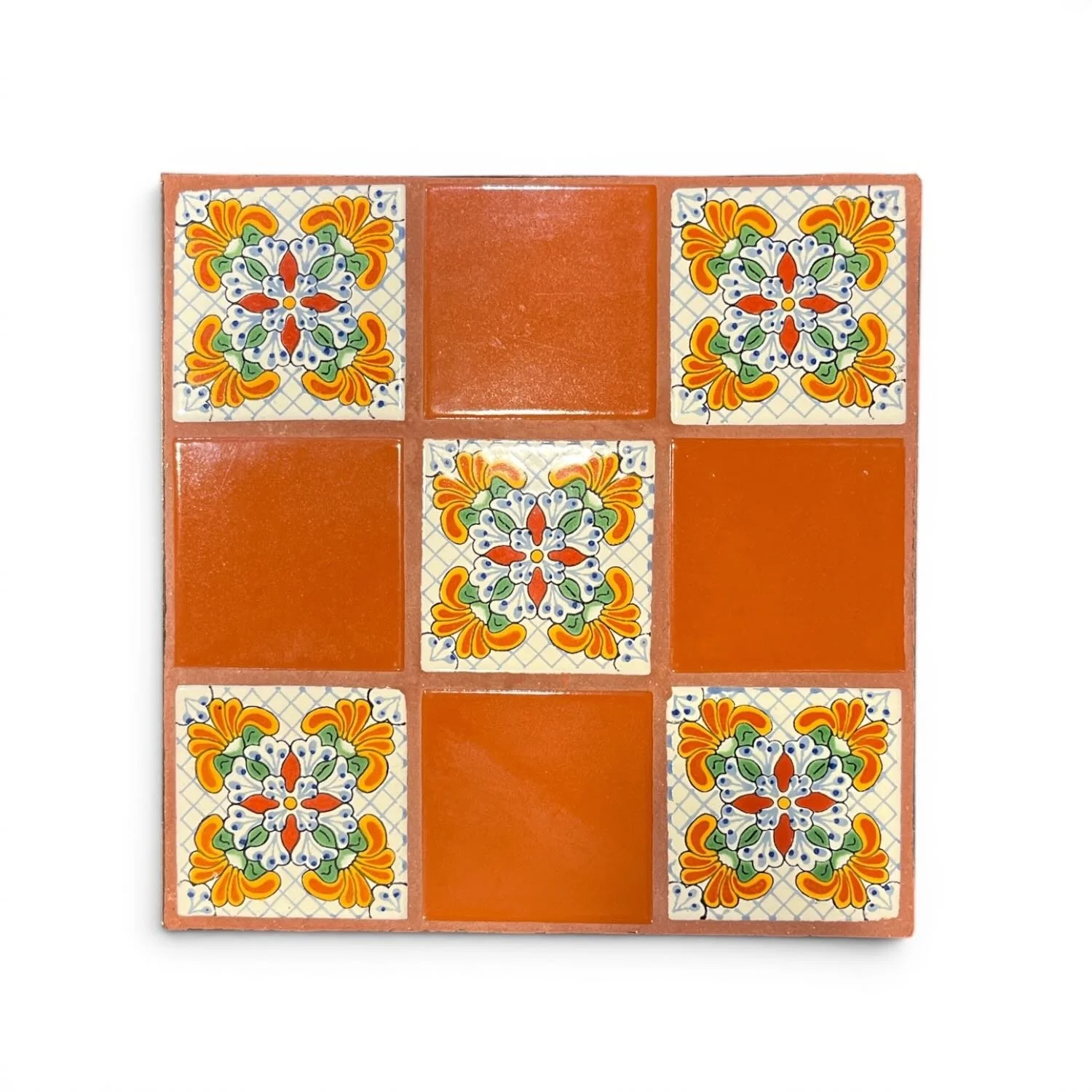 Handcrafted in Mexico, the Talavera Nine Tile Table features nine colorful Talavera tiles, twisted wrought iron legs, and authentic artisan style for indoor or outdoor use.