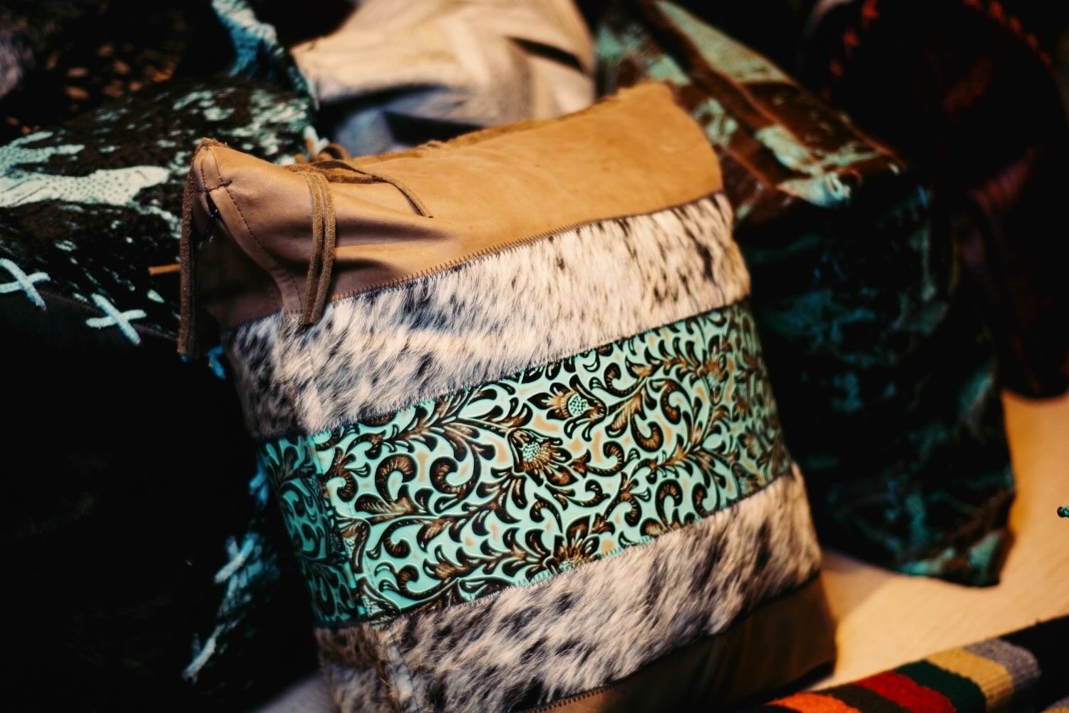 Tooled leather and cowhide pillows from Brazil