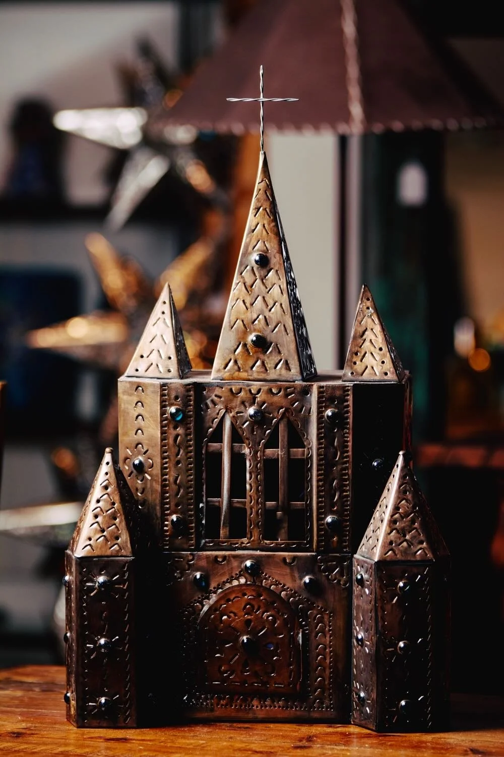Grace in Every Glow.”Our hand-punched Cathedral Lamps shine with intricate detail and sacred beauty — a timeless statement of faith and craftsmanship.