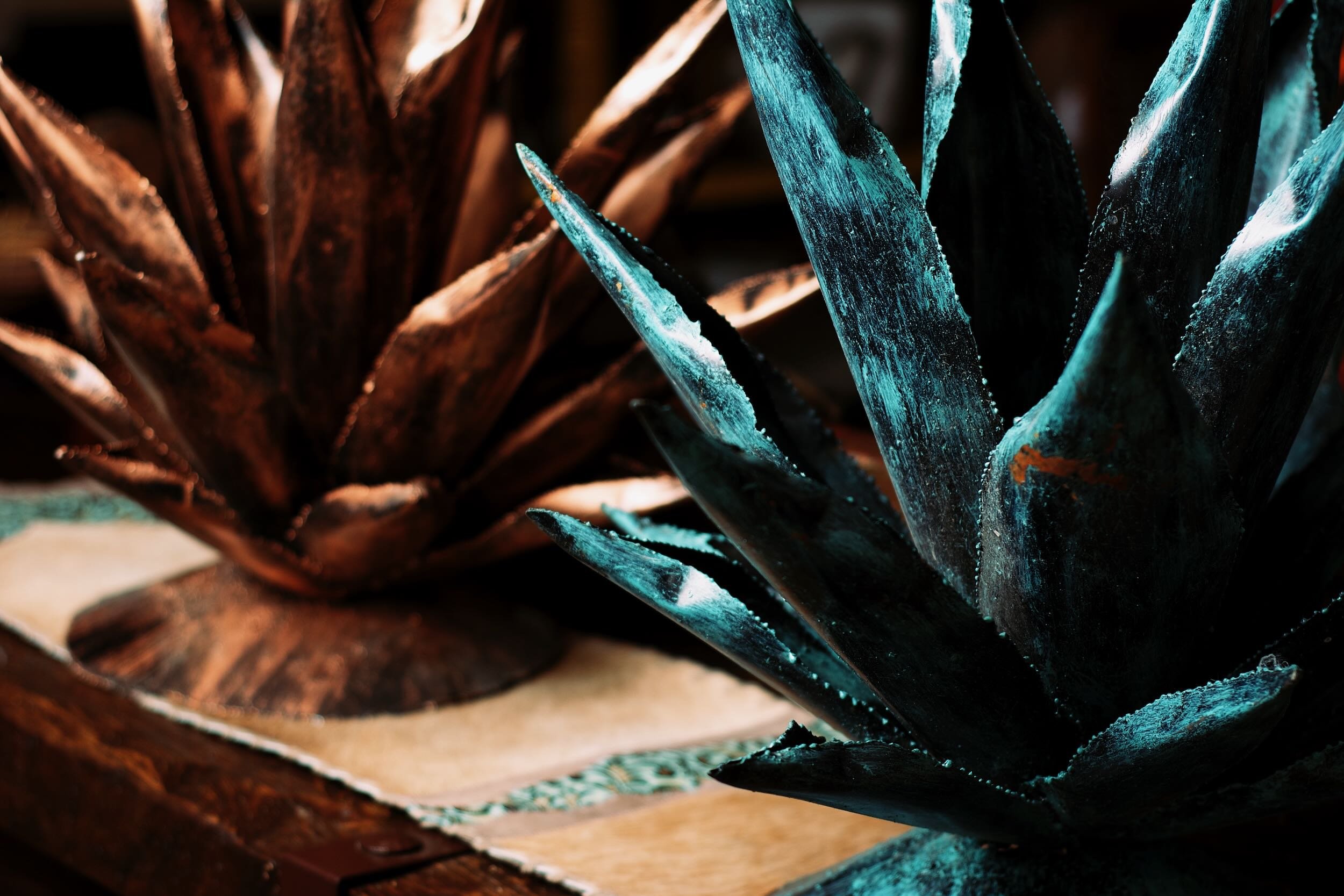 Painted metal agave artwork from Mexico.