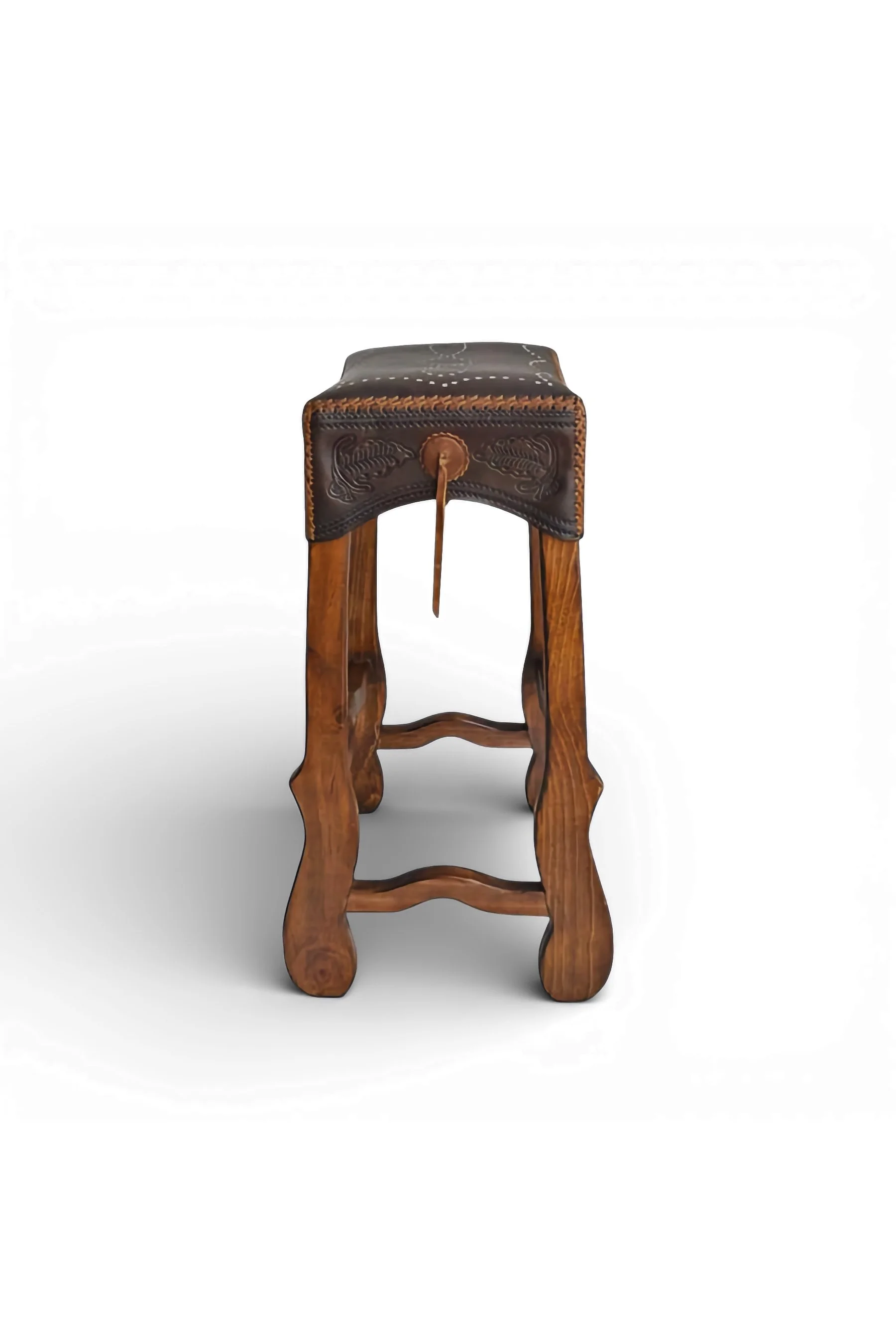Shop a handmade leather saddle stool from Mexico. Rustic wood and stitched leather design for comfortable bar and counter seating.