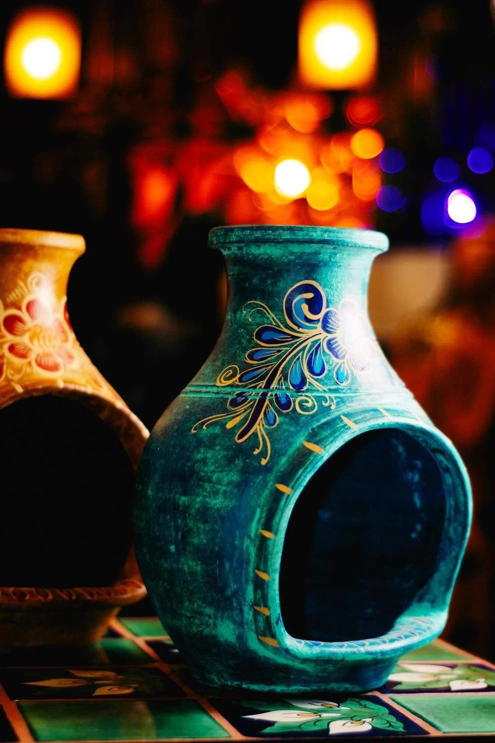 Painted clay chimineas from Mexico.