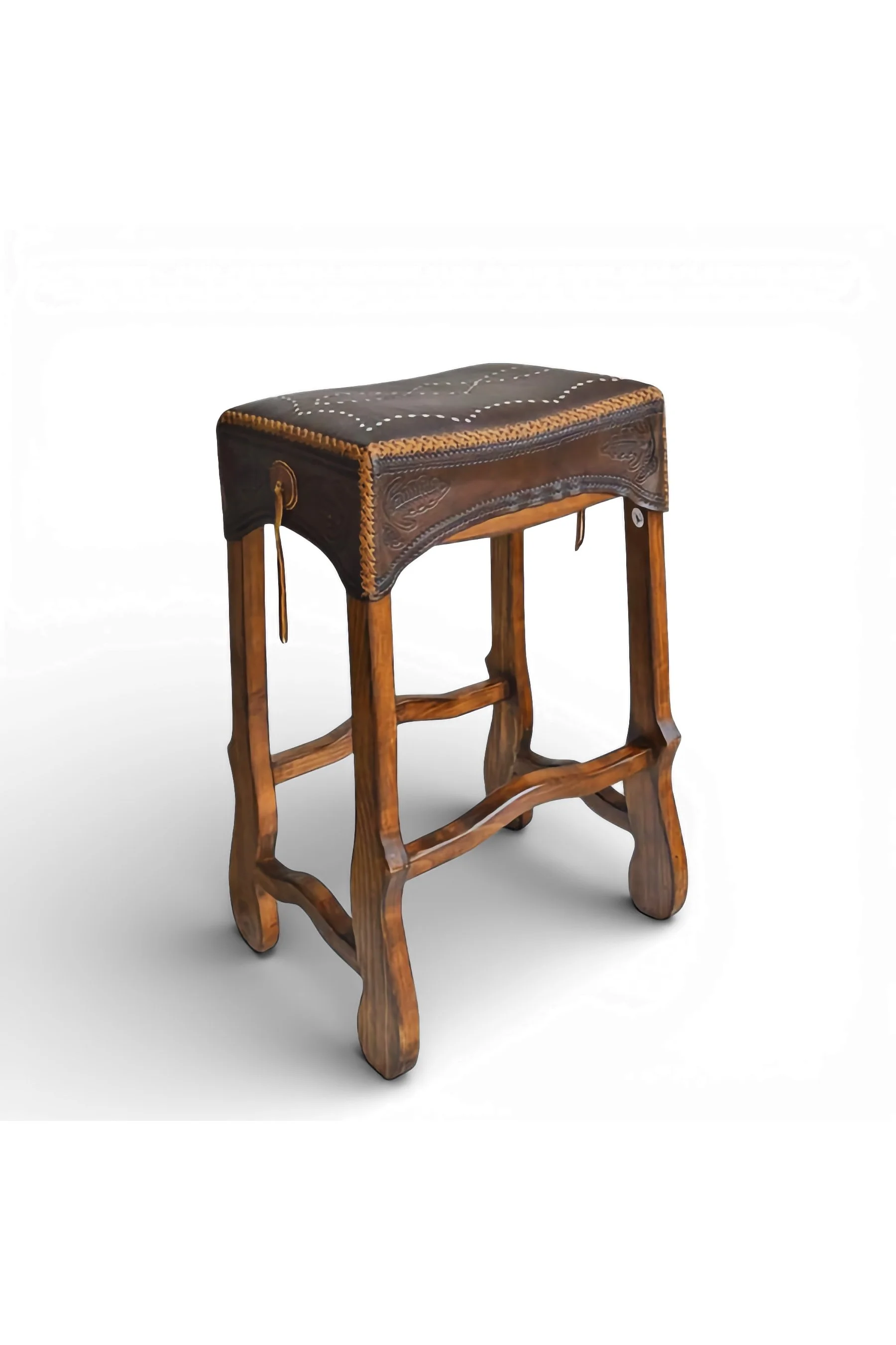 Shop a handmade leather saddle stool from Mexico. Rustic wood and stitched leather design for comfortable bar and counter seating.