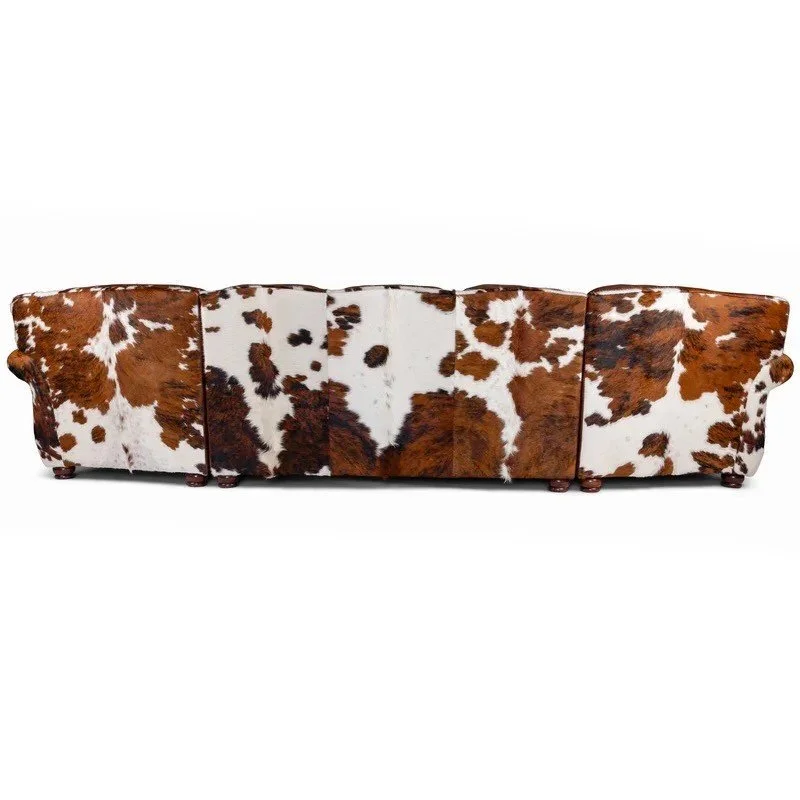 The Big Horn Western Leather Sofa features cowhide, tooled leather, premium top-grain materials, and handcrafted Western design for bold, luxurious interiors.