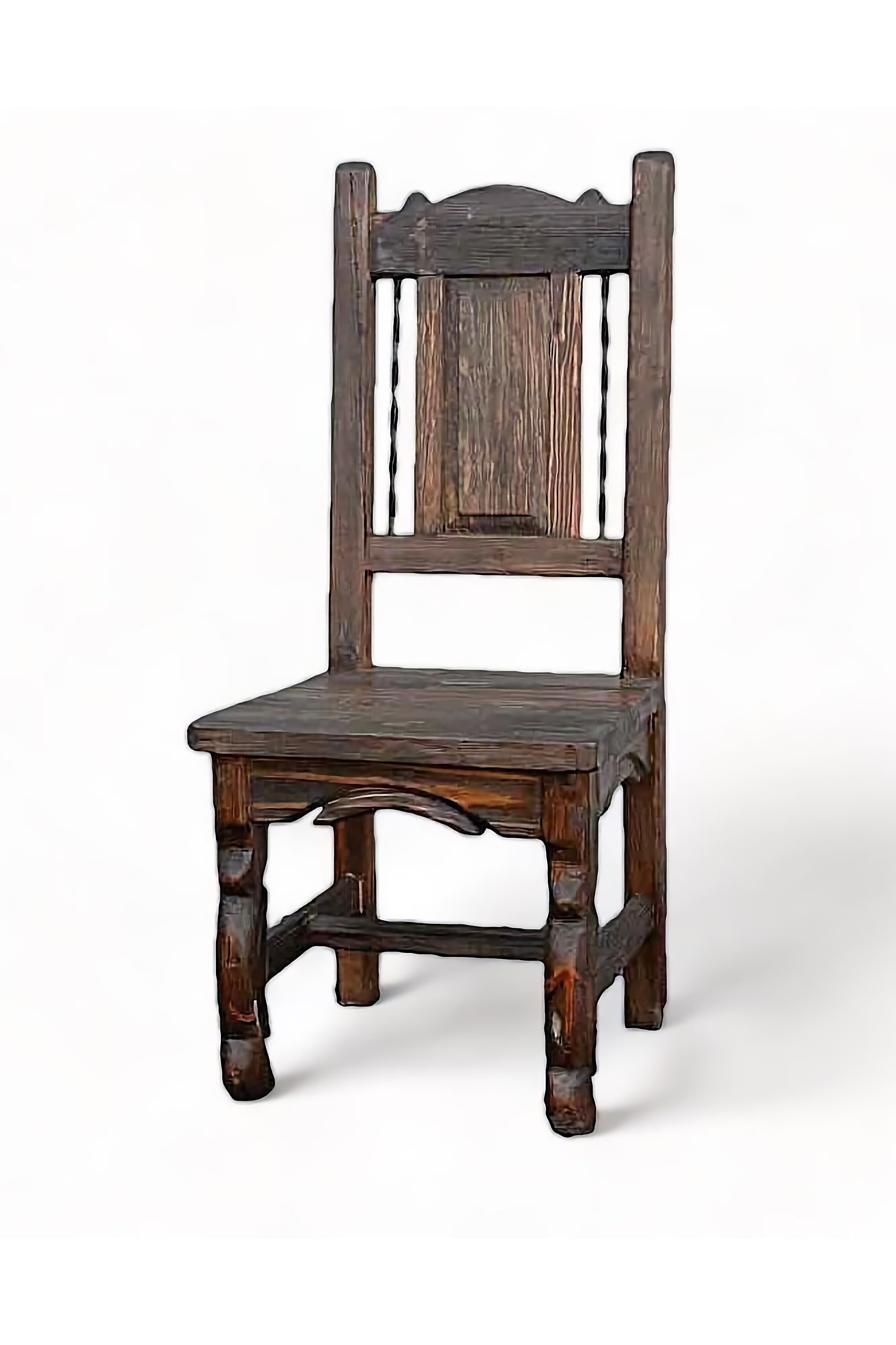 Shop a handmade wood and iron dining chair from Mexico. Reclaimed wood with carved details and twisted iron back for rustic elegance.