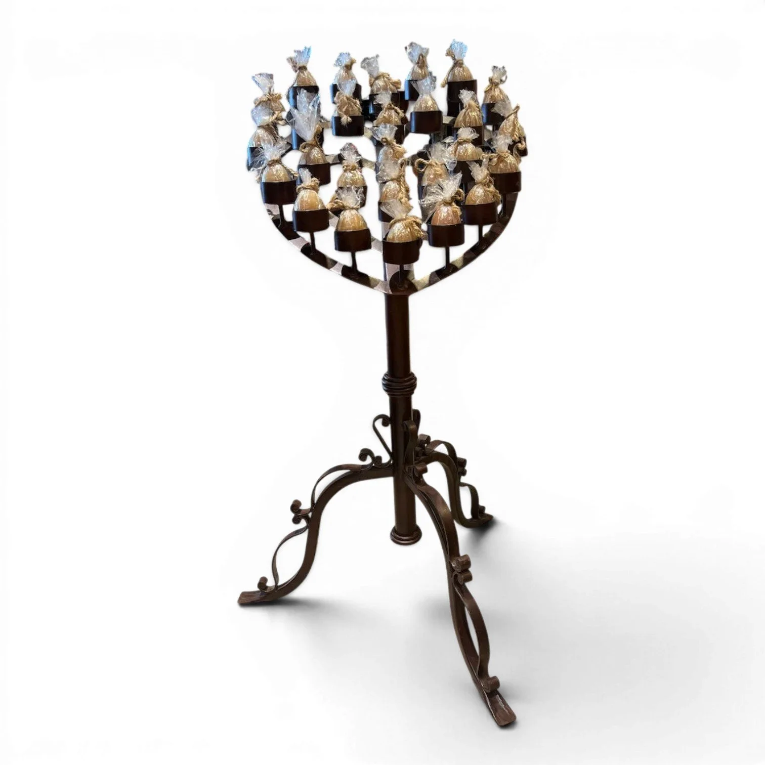 Handmade Mexican wrought iron heart candelabra centerpiece with bronze finish and elegant scrollwork