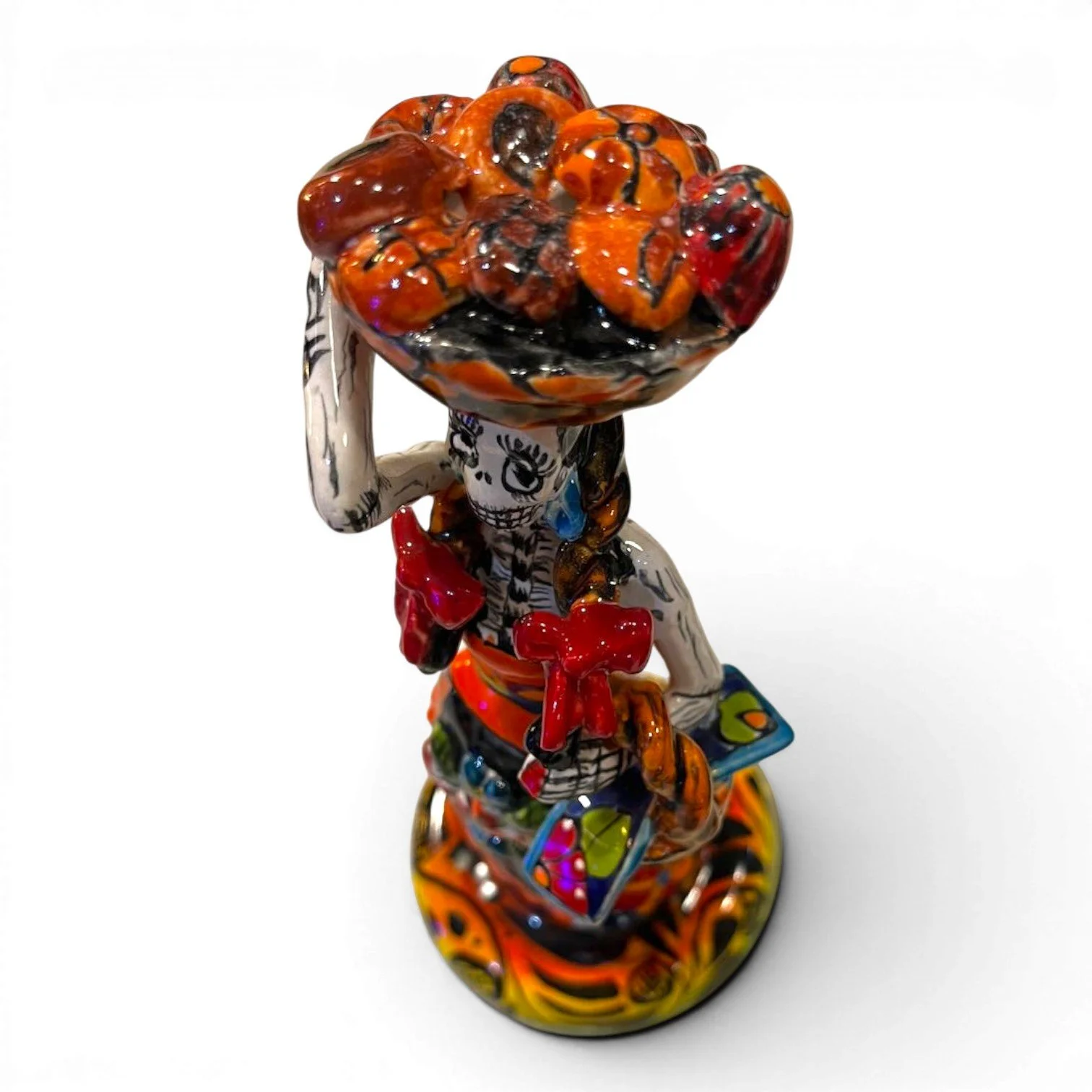 Handmade Mexican Catrina folk art figure with fruit basket, colorful dress and apron