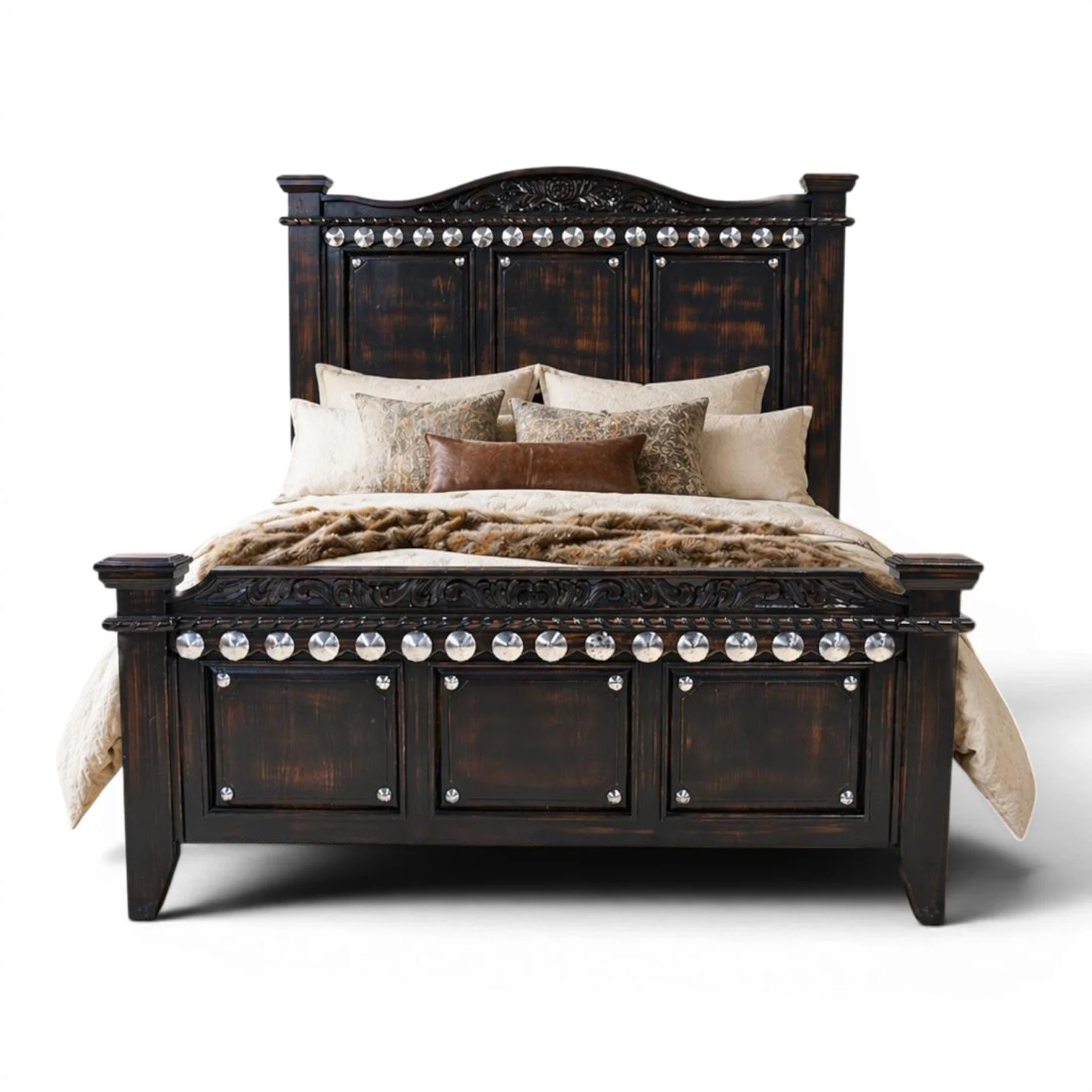 Handmade Arenas Negras bed with distressed black finish, hand-carved details, and silver clavos accents