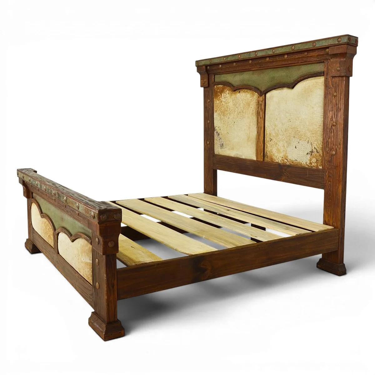 White Sands Copper and Cowhide Bed handcrafted in Mexico with leather panels, hand-pounded copper trim, clavos, and carved wood details.