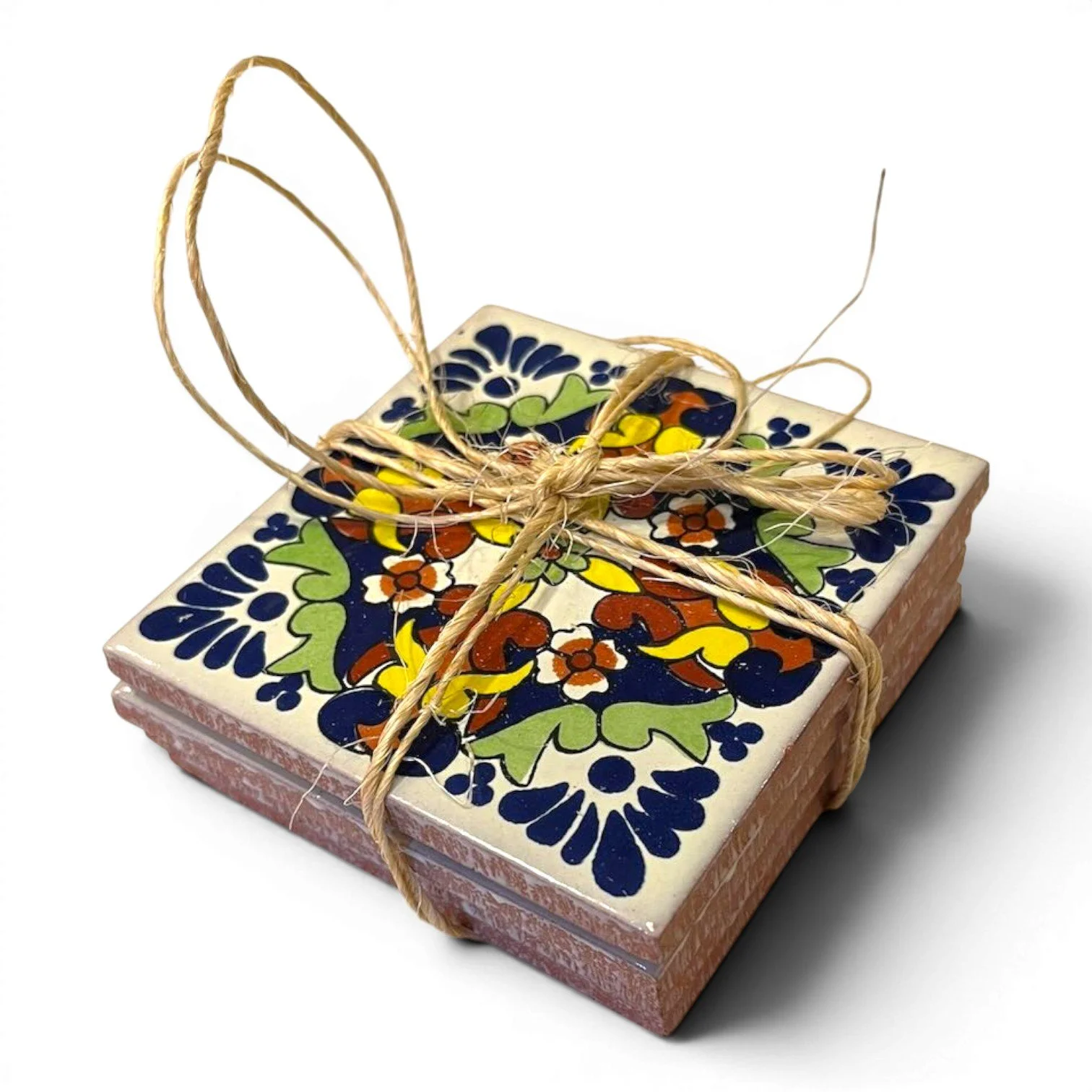 Set of four colorful Talavera tile coasters with hand-painted Mexican pottery designs