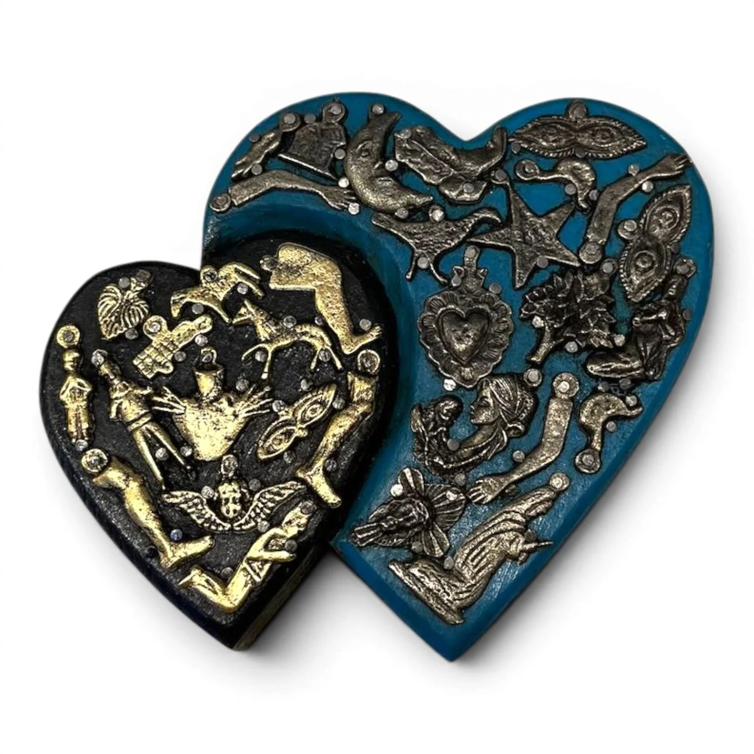 Handmade Mexican double heart wall décor with blue and black hand-painted hearts accented by traditional silver Milagros charms.