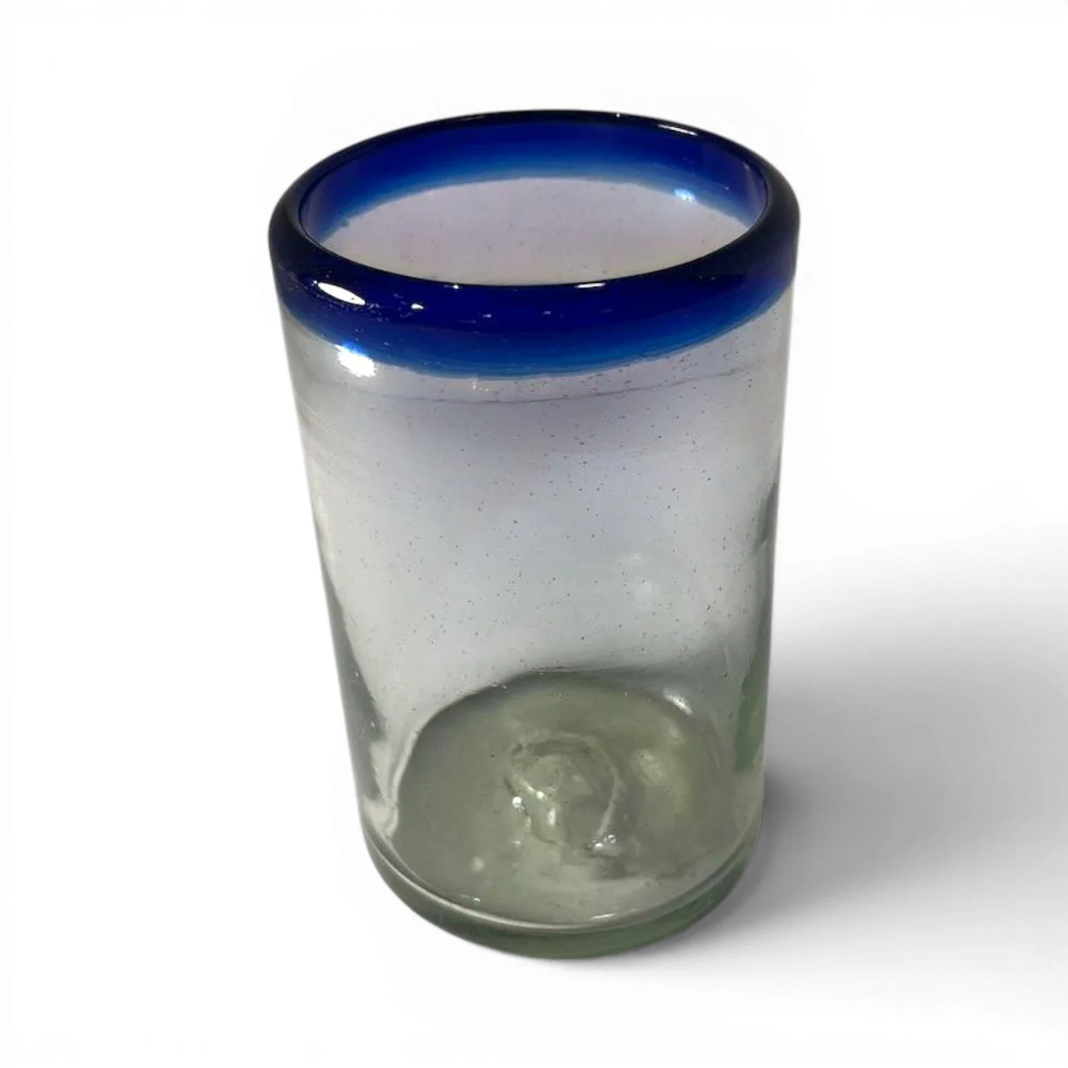 Handmade Mexican Cantina tall glass with traditional cobalt blue rim and handblown artisan craftsmanship.