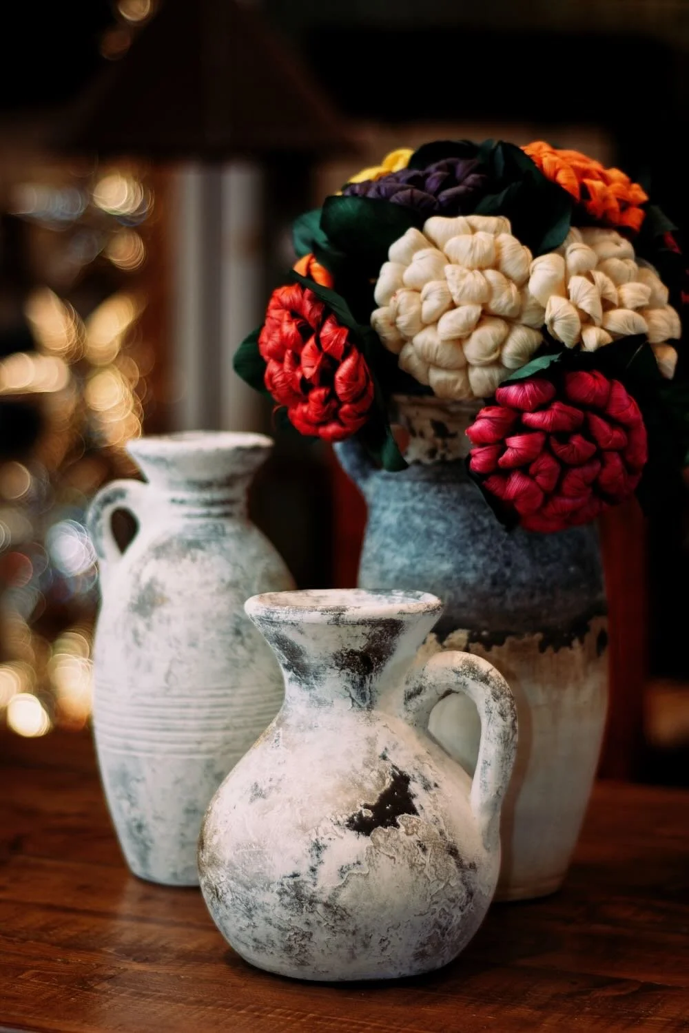 Distressed White Clay Vases with Cornhusk Flowers from Mexico