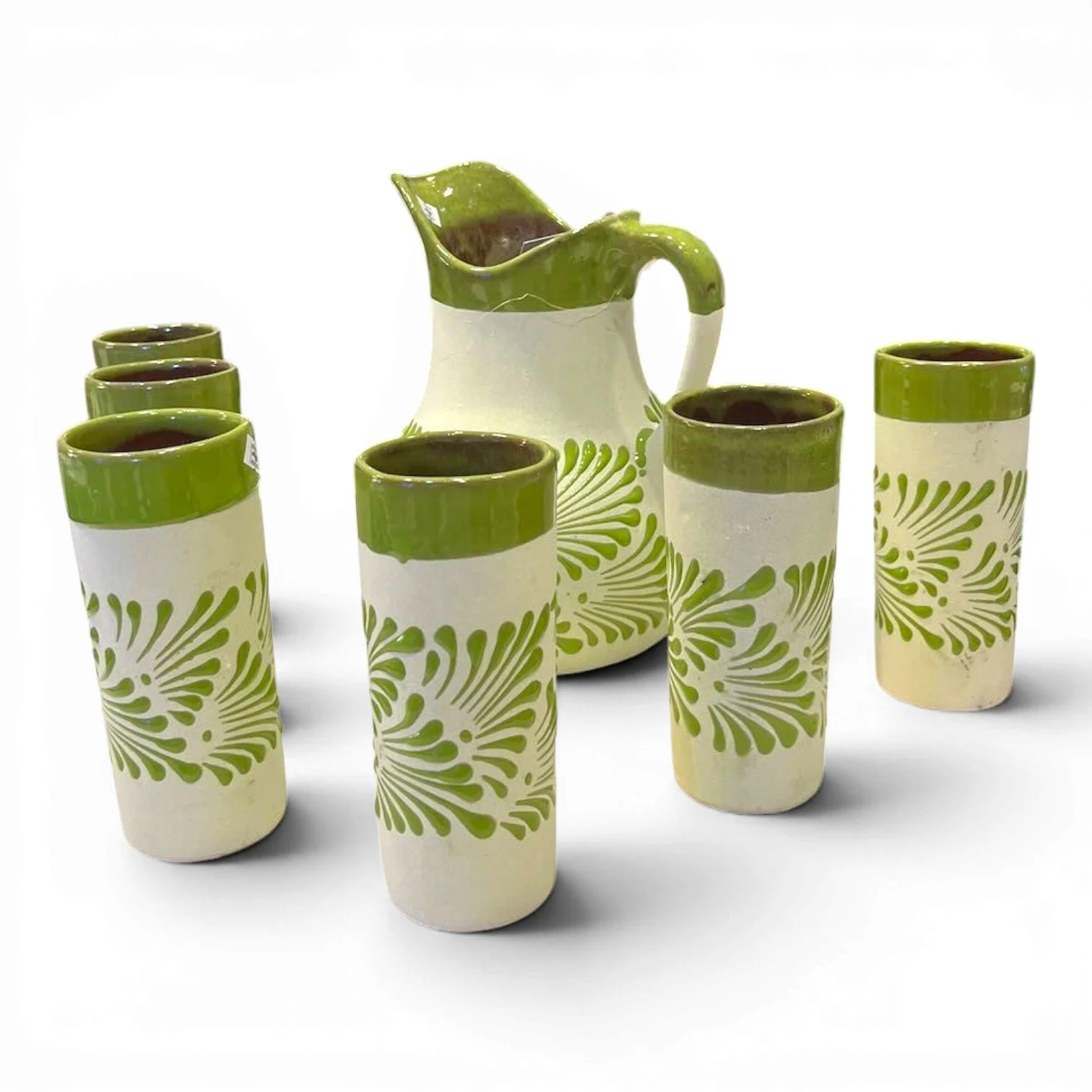Handmade Mexican barro pitcher and six tumbler set with hand-painted avocado-style Talavera design and glazed rims.