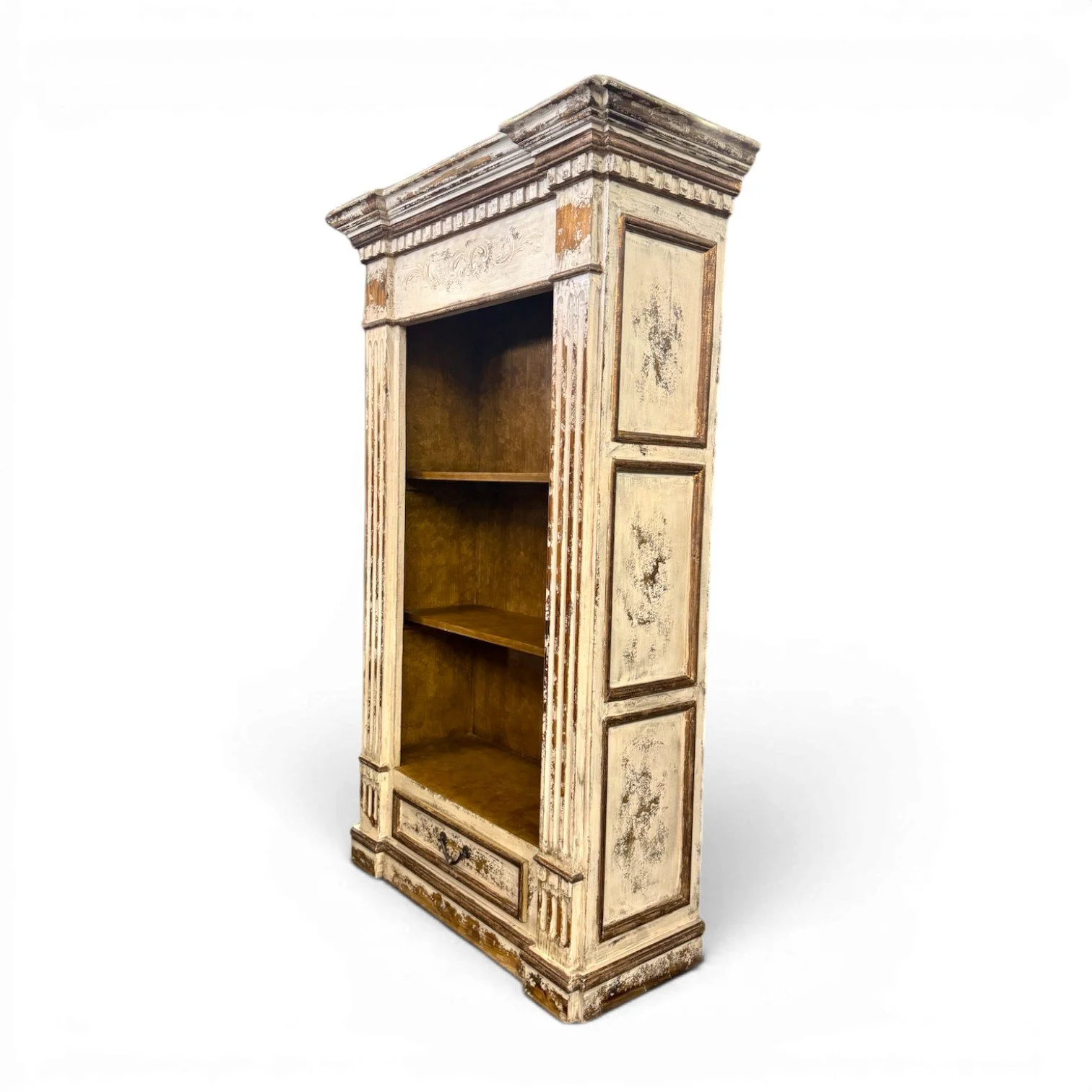 Madrid Antique White handcrafted Peruvian bookcase with distressed finish, carved details, fluted columns, open shelving, and lower storage drawer.