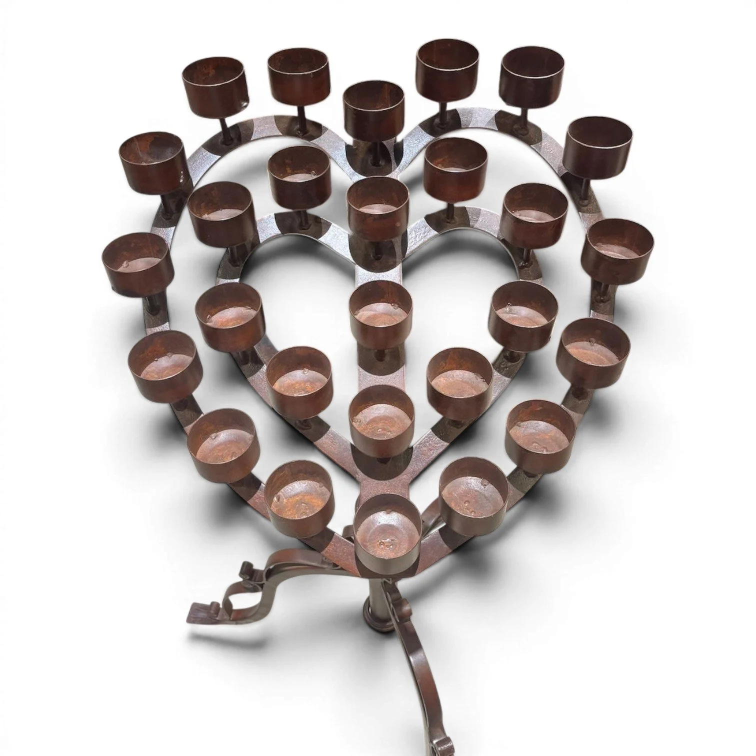 Handmade Mexican wrought iron heart candelabra centerpiece with bronze finish and elegant scrollwork