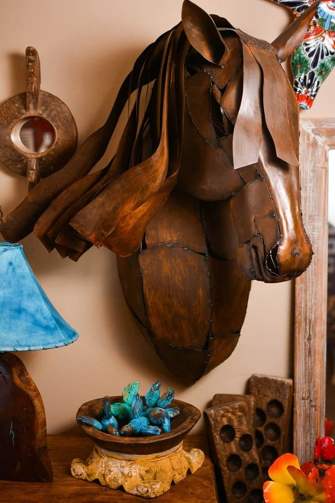 Handmade metal wall art horse from Mexico.