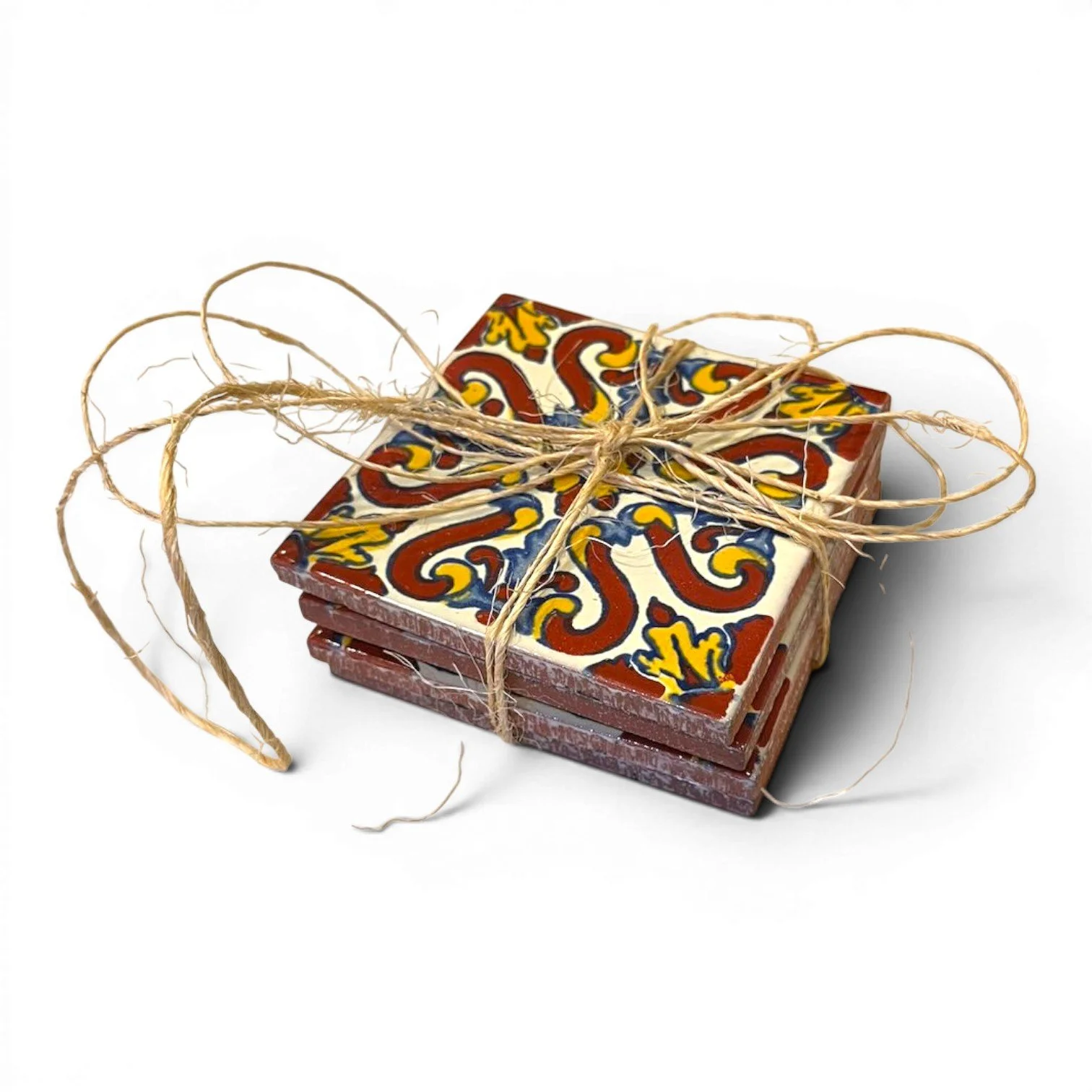Set of four colorful Talavera tile coasters with hand-painted Mexican pottery designs