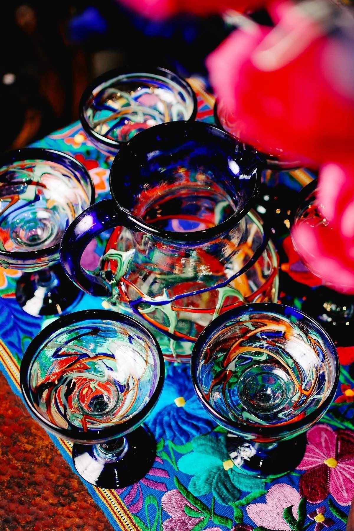 Handblown glassware from Mexico on an embroidered table runner