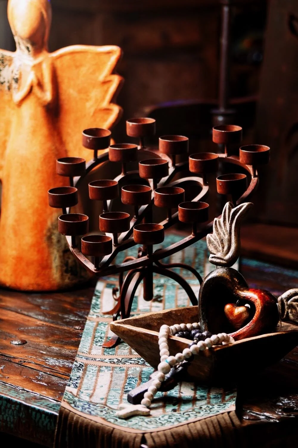 Add artisanal charm to your home with the Candelabro Elegante de Corazón, a handmade wrought iron candelabra from Mexico.