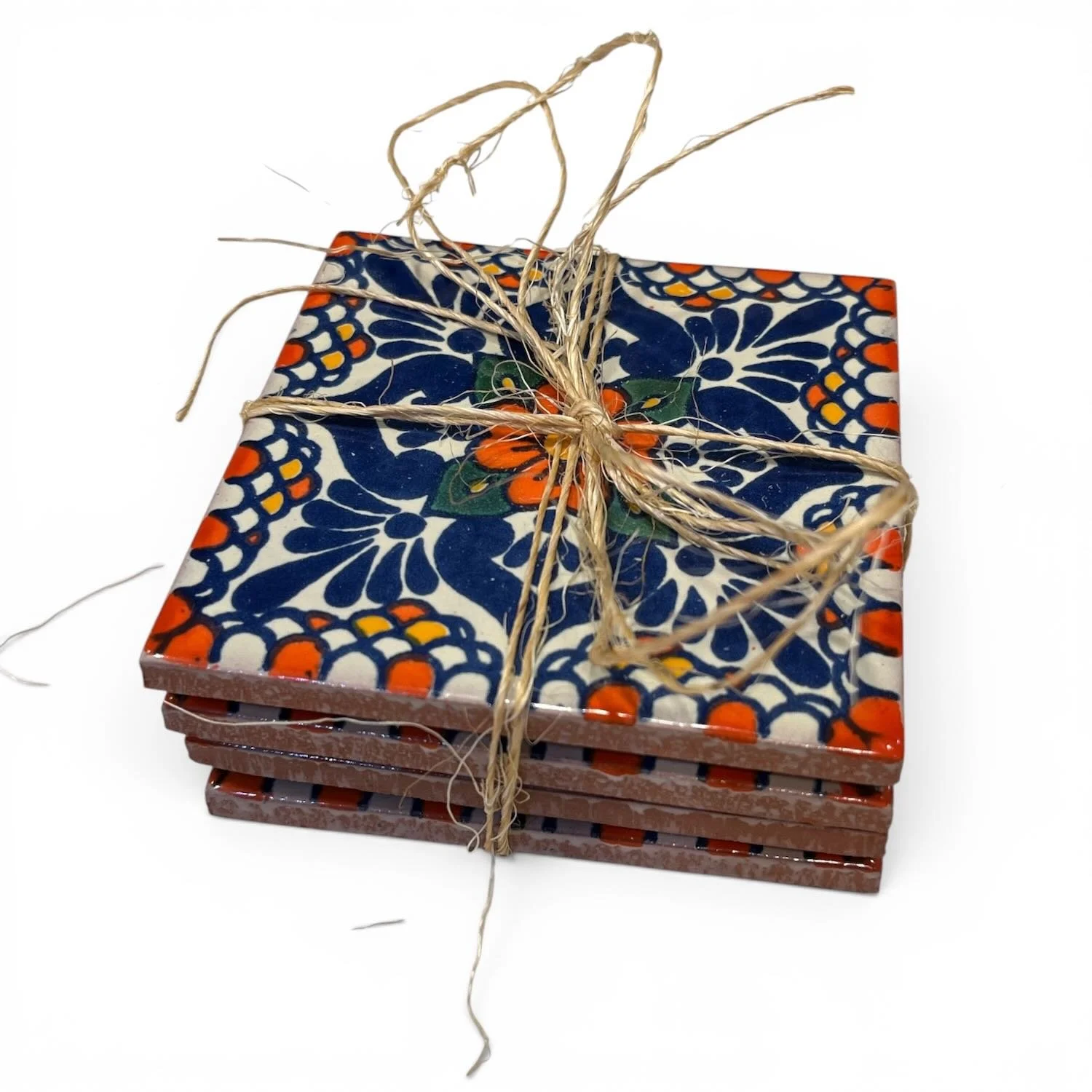 Handmade Talavera tile coaster set from Mexico featuring four colorful ceramic coasters with protective rubber bumpers.