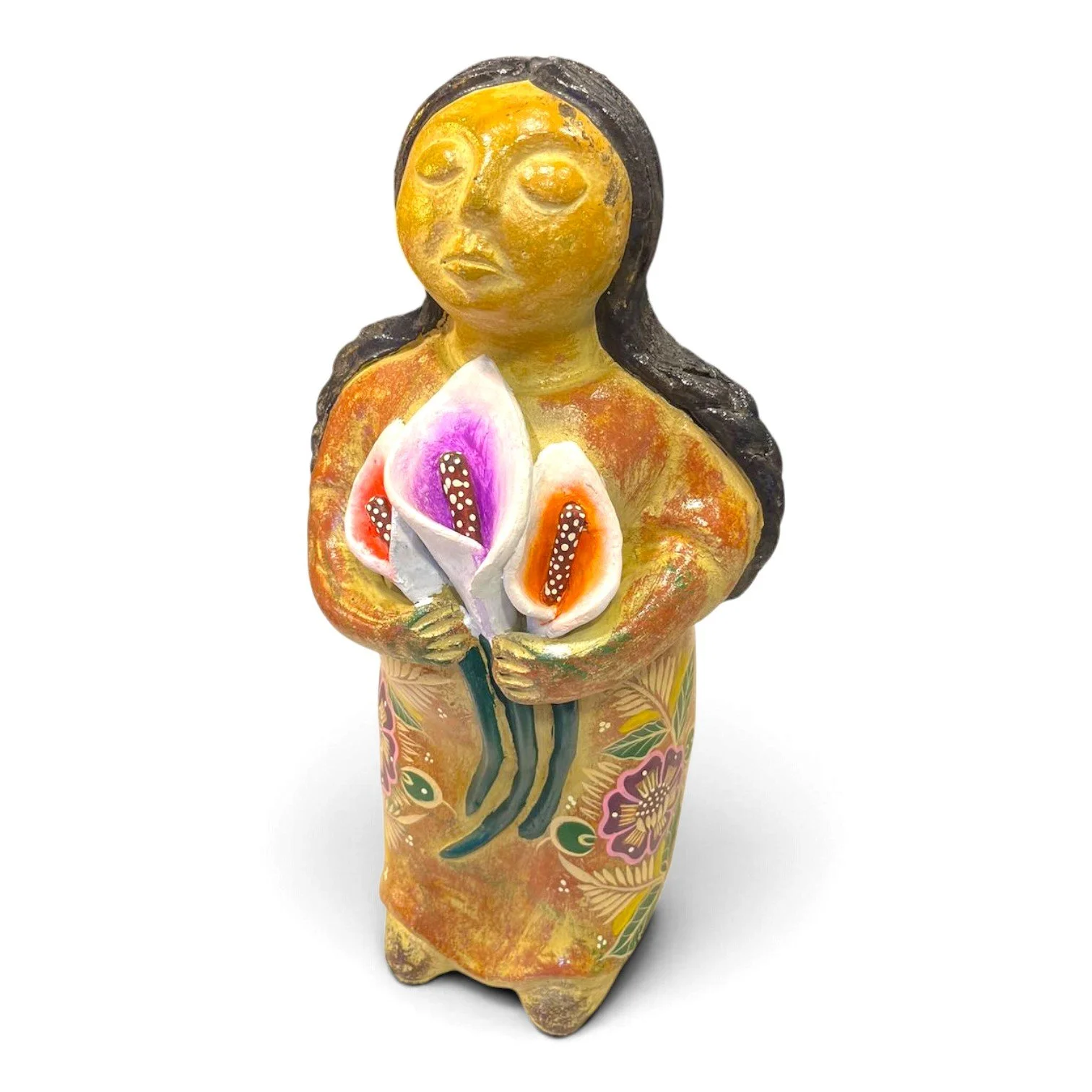 Handmade Mexican clay figure of a woman holding three calla lilies
