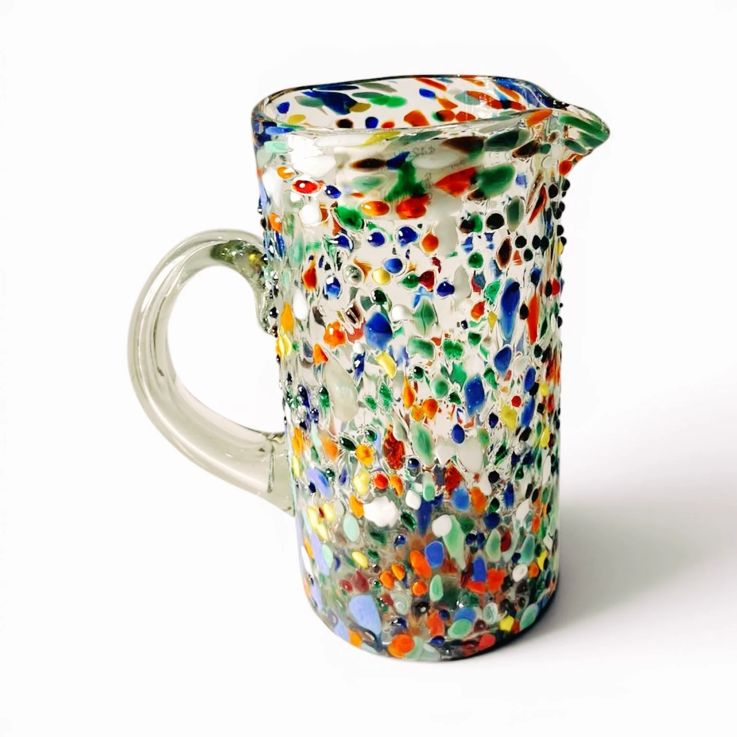 Handmade Mexican Guanajuato confetti glass pitcher with vibrant artisan colors and textured finish.