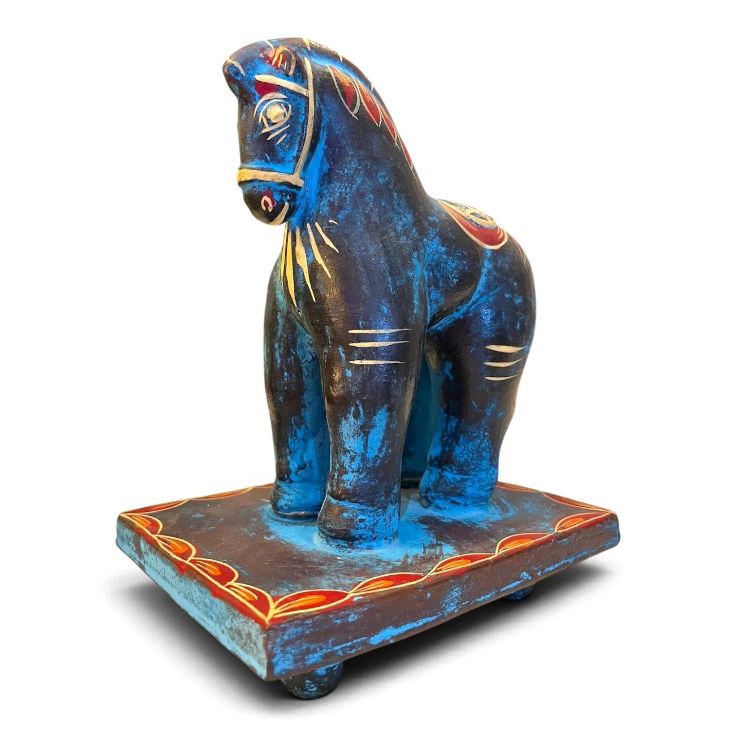 Handmade clay Trojan horse figure with unique hand-painted design on a pedestal