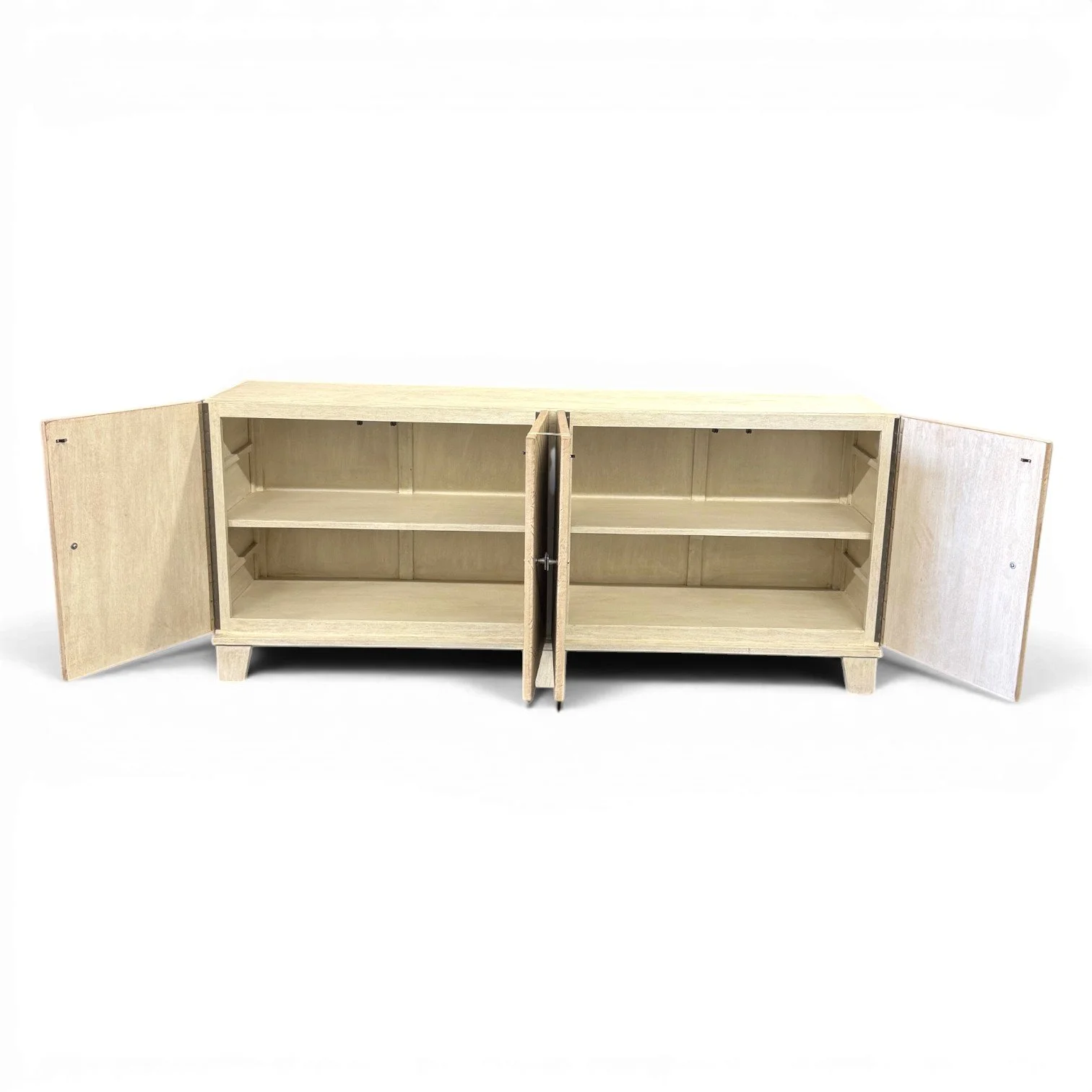 Handmade wood buffet with cream leather doors and carved geometric pattern