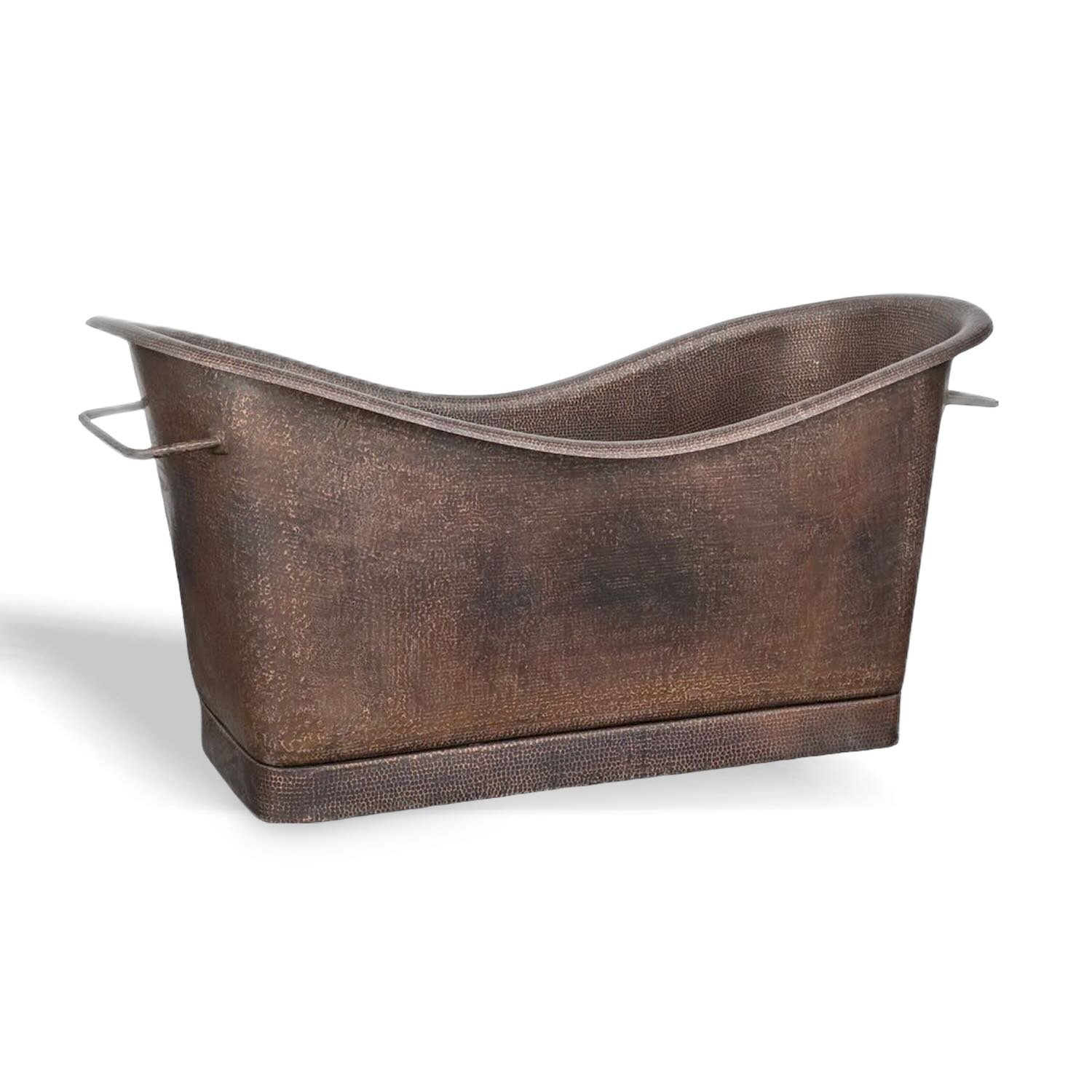 Handmade Hacienda 67-inch hammered copper rectangular bathtub with integrated towel bars and oil rubbed bronze finish.