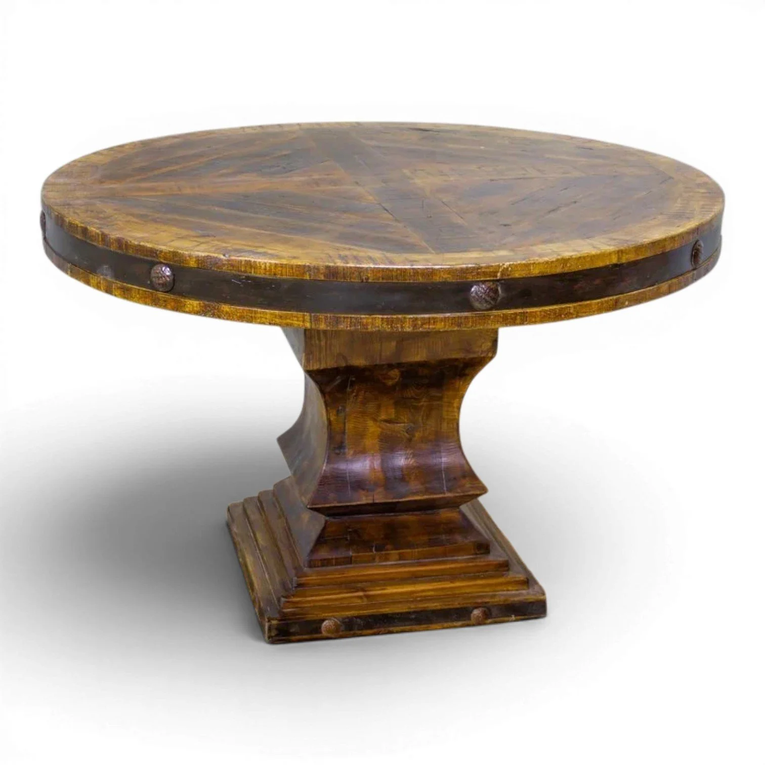 Hacienda Rustica Redonda handmade reclaimed wood dining table from Mexico with iron trim, decorative clavos, pedestal base, and rich dark stained finish.