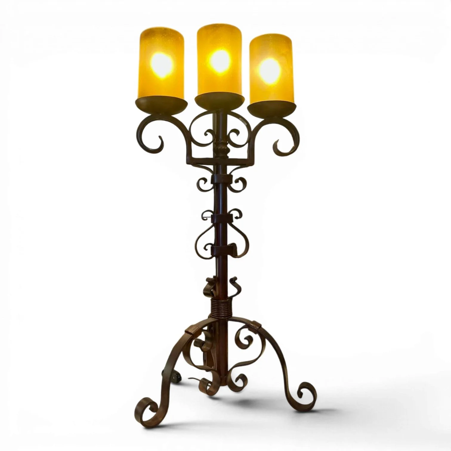 Handmade Mexican wrought iron scroll candelabra lamp with handblown amber glass shades