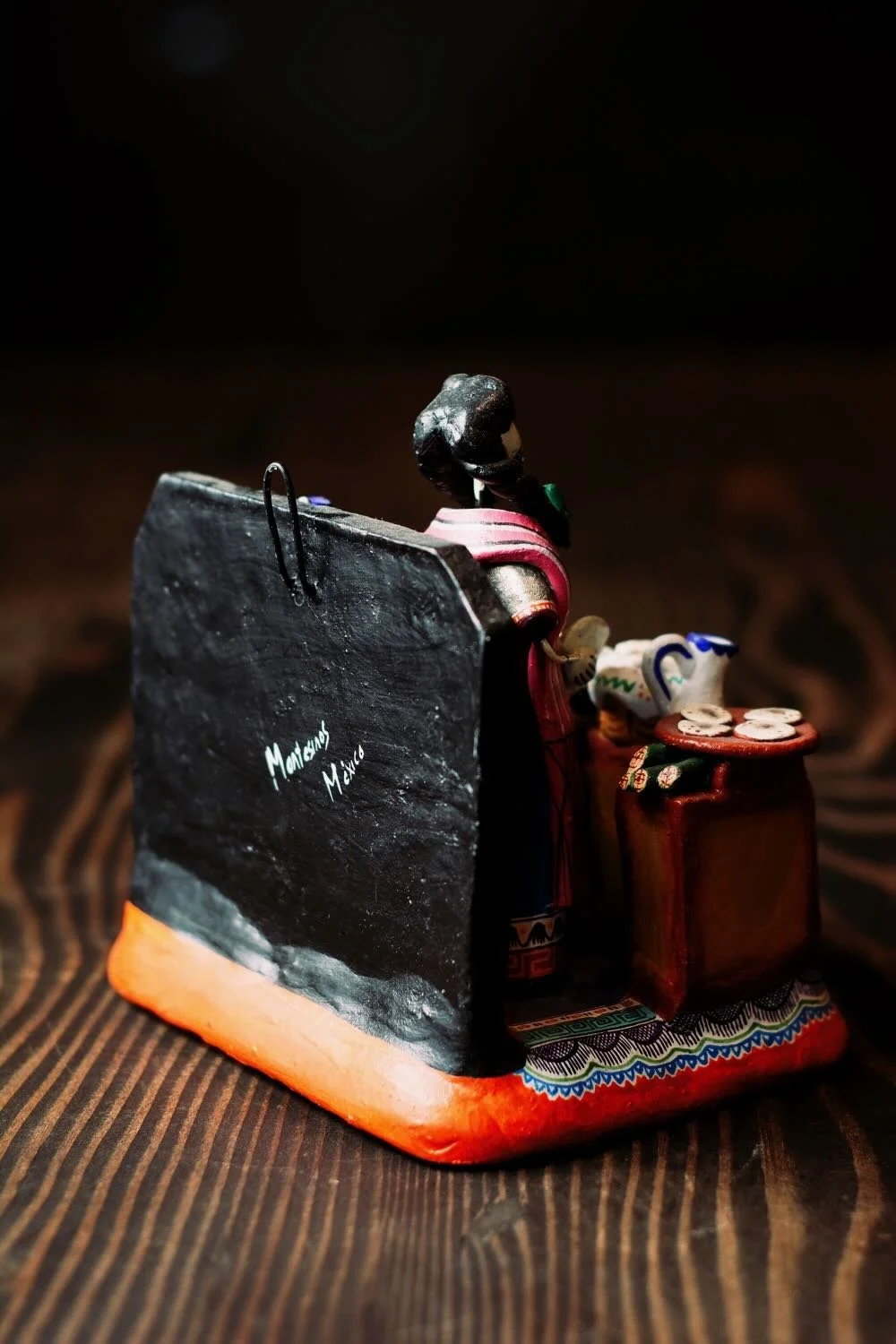 Shop a handmade Catrina kitchen scene from Mexico. Colorful clay folk art featuring a tortilla-making Catrina, perfect for unique decor displays.