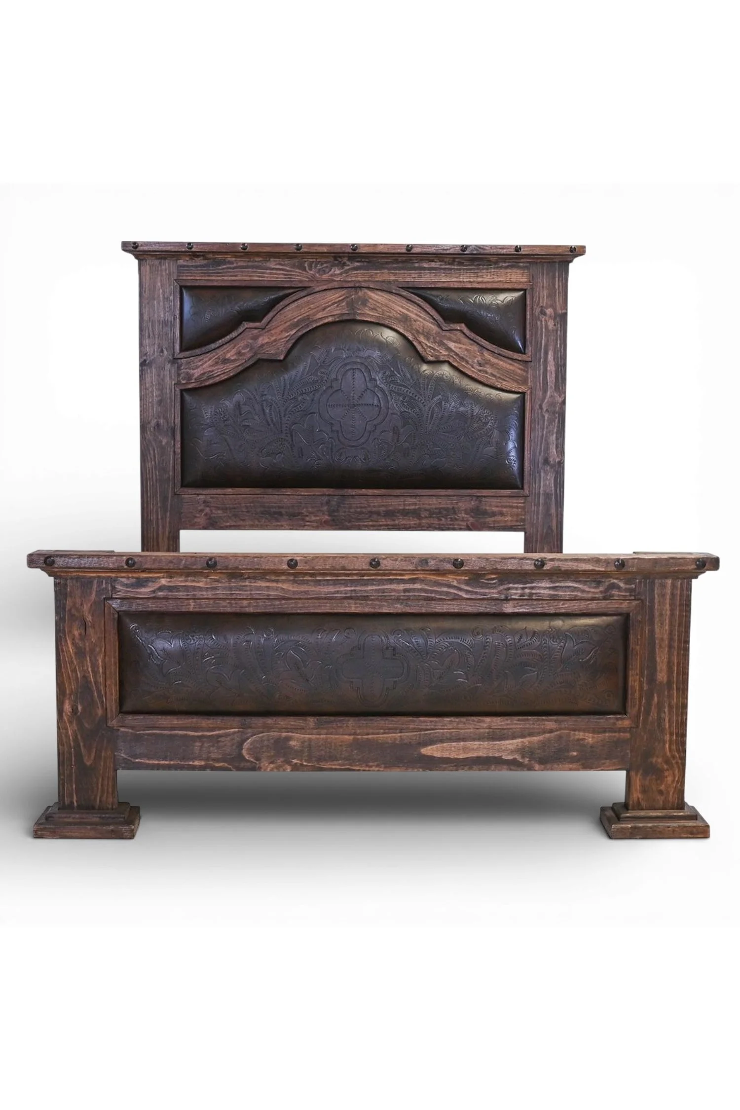 Shop a handmade tooled leather bed from Mexico. Rustic reclaimed wood frame with artisan craftsmanship for elegant hacienda-style bedrooms.