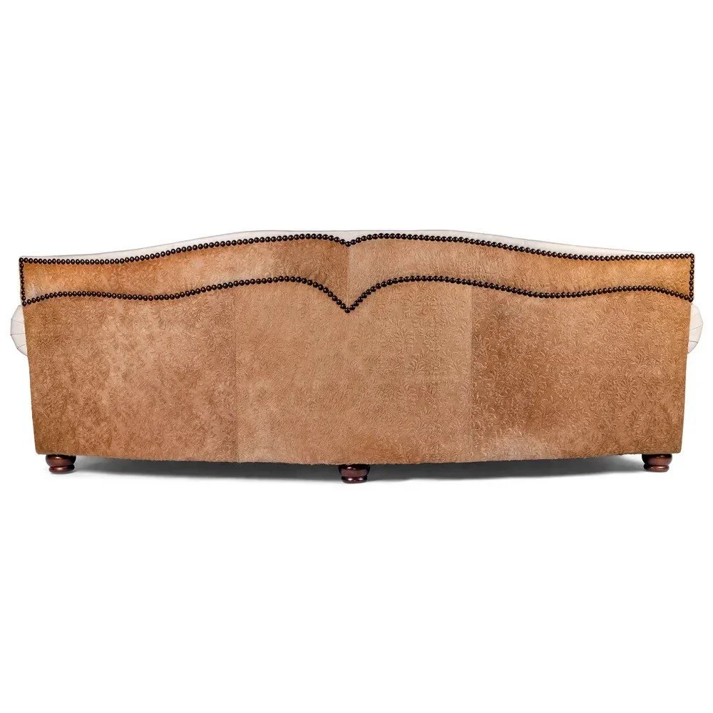 The Point Dume Leather Trim Sofa features premium top-grain leather, refined Western styling, nailhead trim, and handcrafted construction for timeless luxury and comfort.