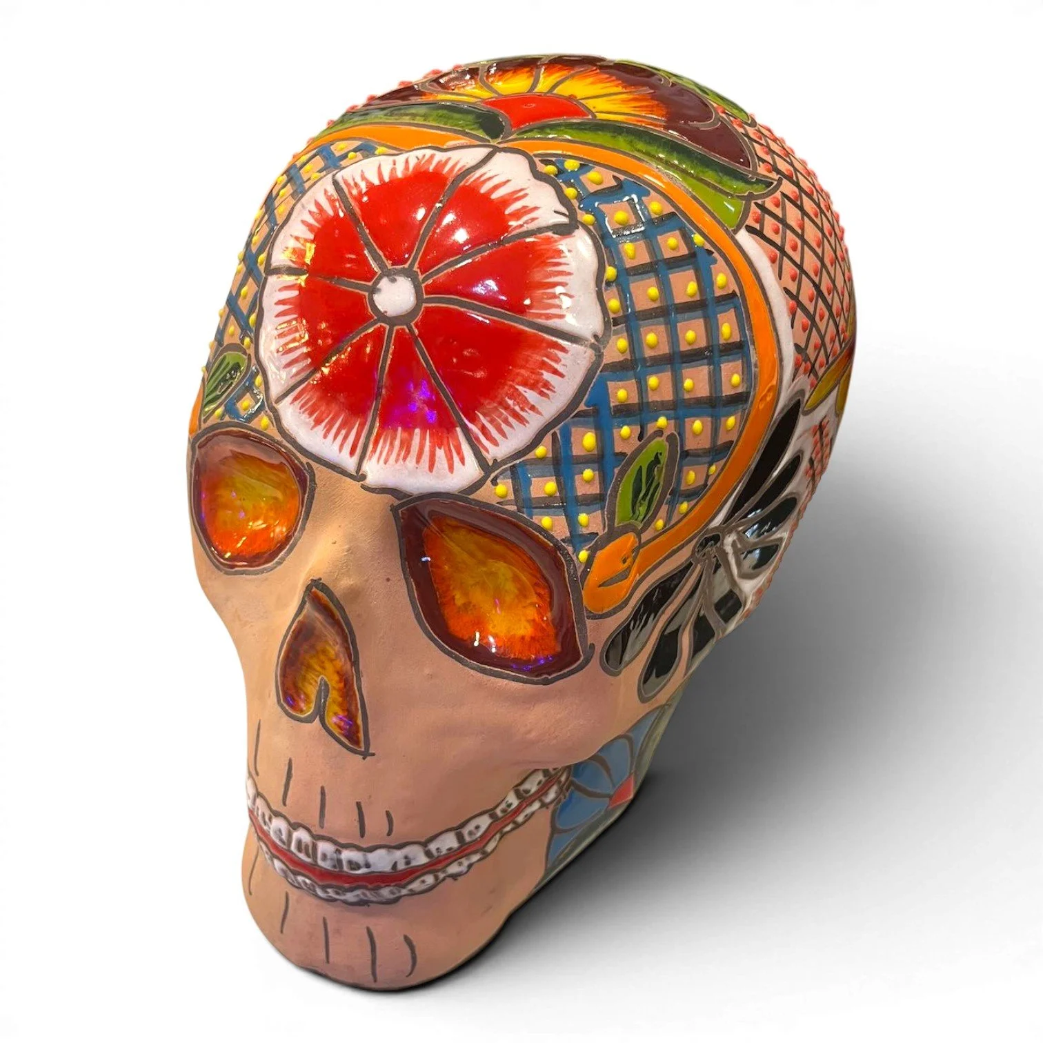 Handmade Mexican Talavera painted clay skull with vibrant artisan design