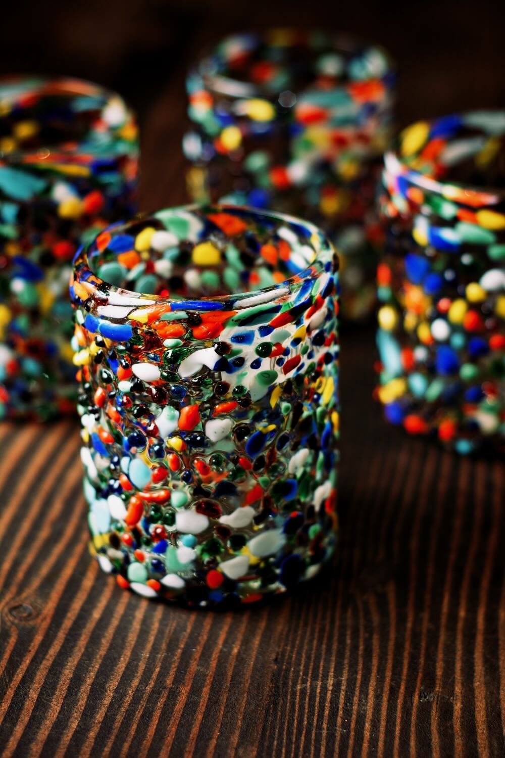 Shop a handblown Guanajuato tumbler from Mexico. Colorful confetti glassware perfect for everyday drinks, entertaining, and unique table settings.