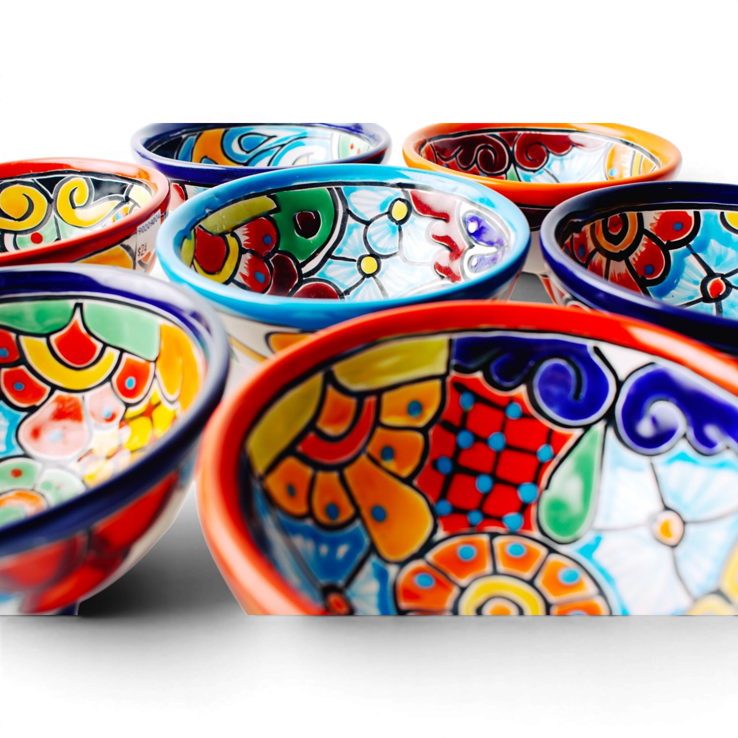 Handmade Mexican Talavera molcajete bowl with colorful hand-painted design and three-legged base
