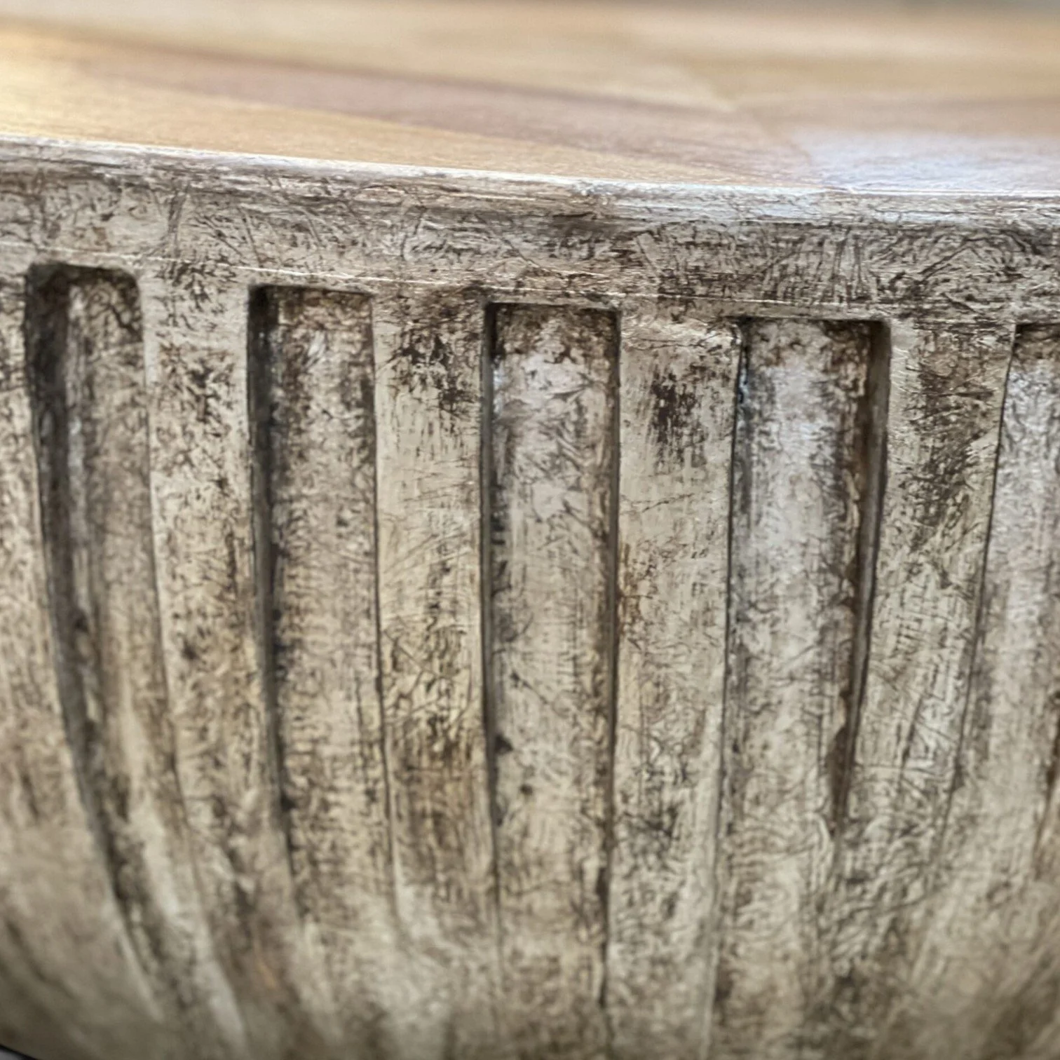 Handmade round coffee table with parquet wood top and silver leaf ribbed base