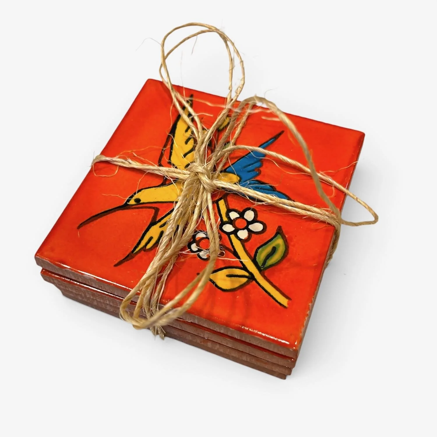 Handmade Talavera tile coaster set from Mexico featuring four colorful ceramic coasters with protective rubber bumpers.